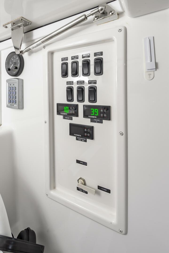a white electrical device aboard MERCENARIA Yacht for Sale