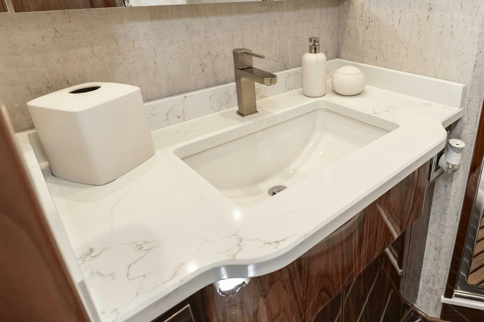 a bathroom sink with a toilet aboard MERCENARIA Yacht for Sale