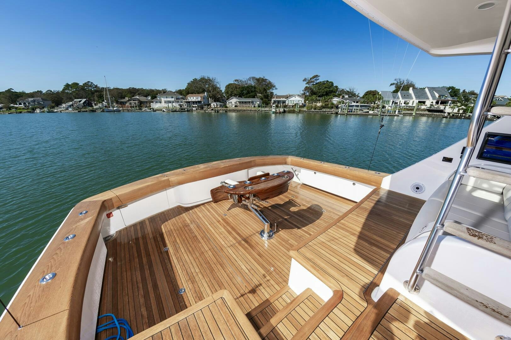 a deck with a view of a city and water aboard MERCENARIA Yacht for Sale