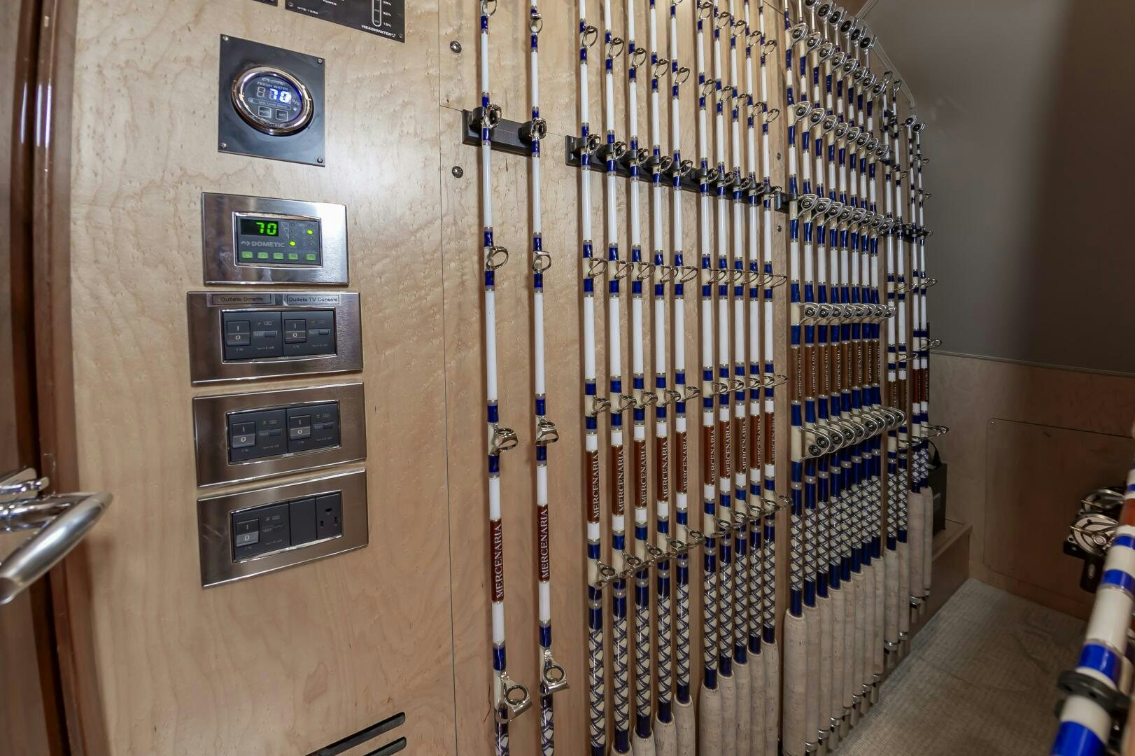 a server room with a rack of computer servers aboard MERCENARIA Yacht for Sale