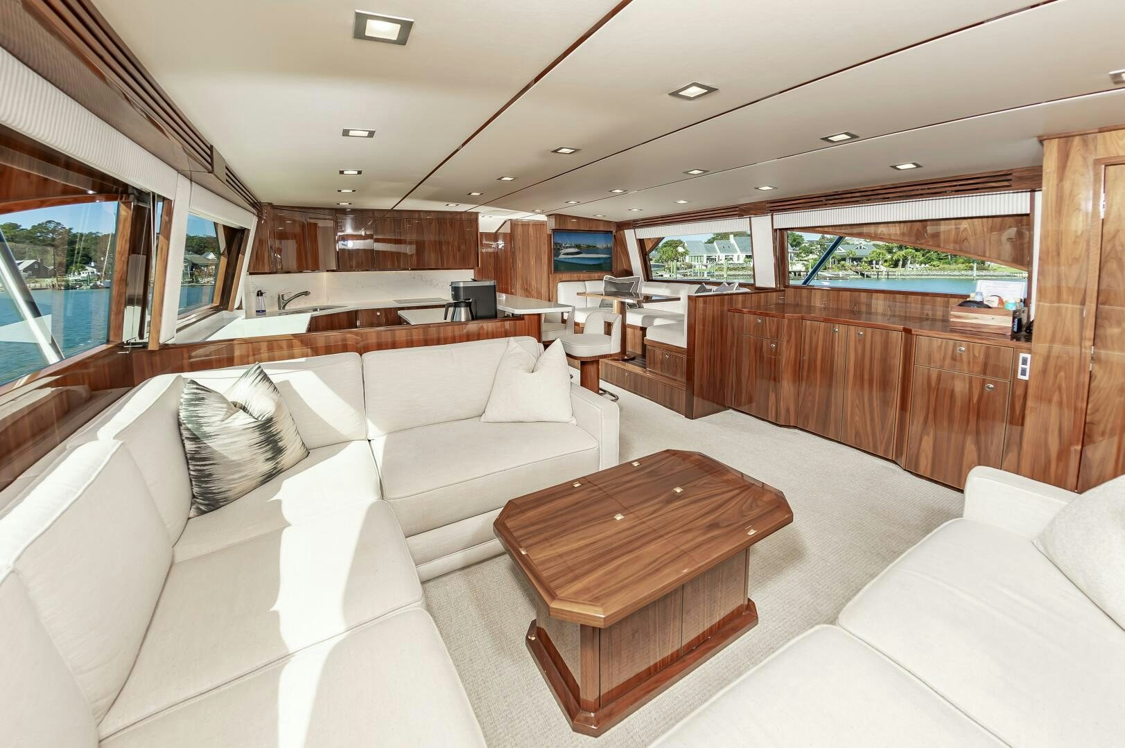 a room with a couch and a table aboard MERCENARIA Yacht for Sale