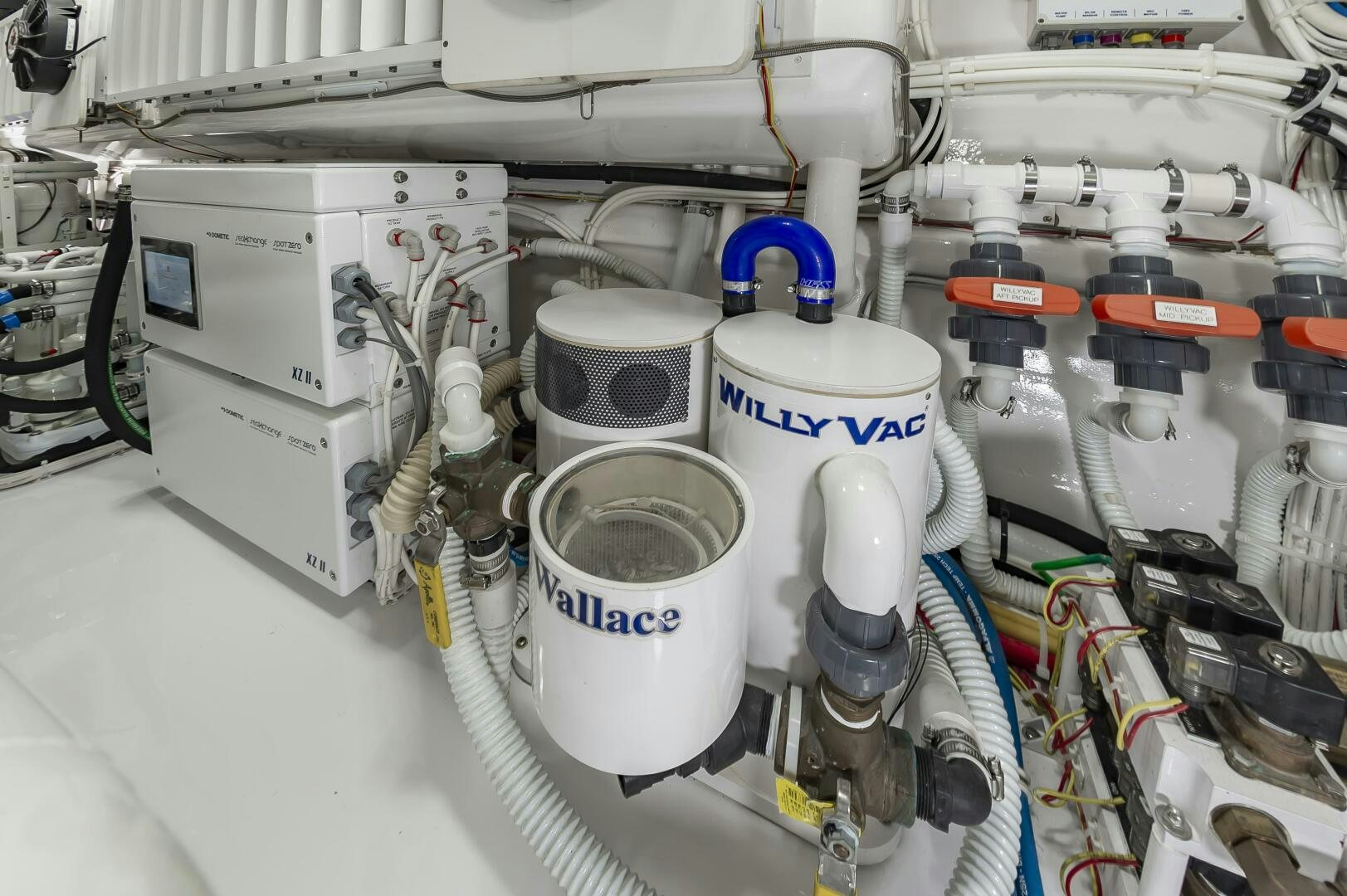 several white machines with blue and white tubes aboard MERCENARIA Yacht for Sale