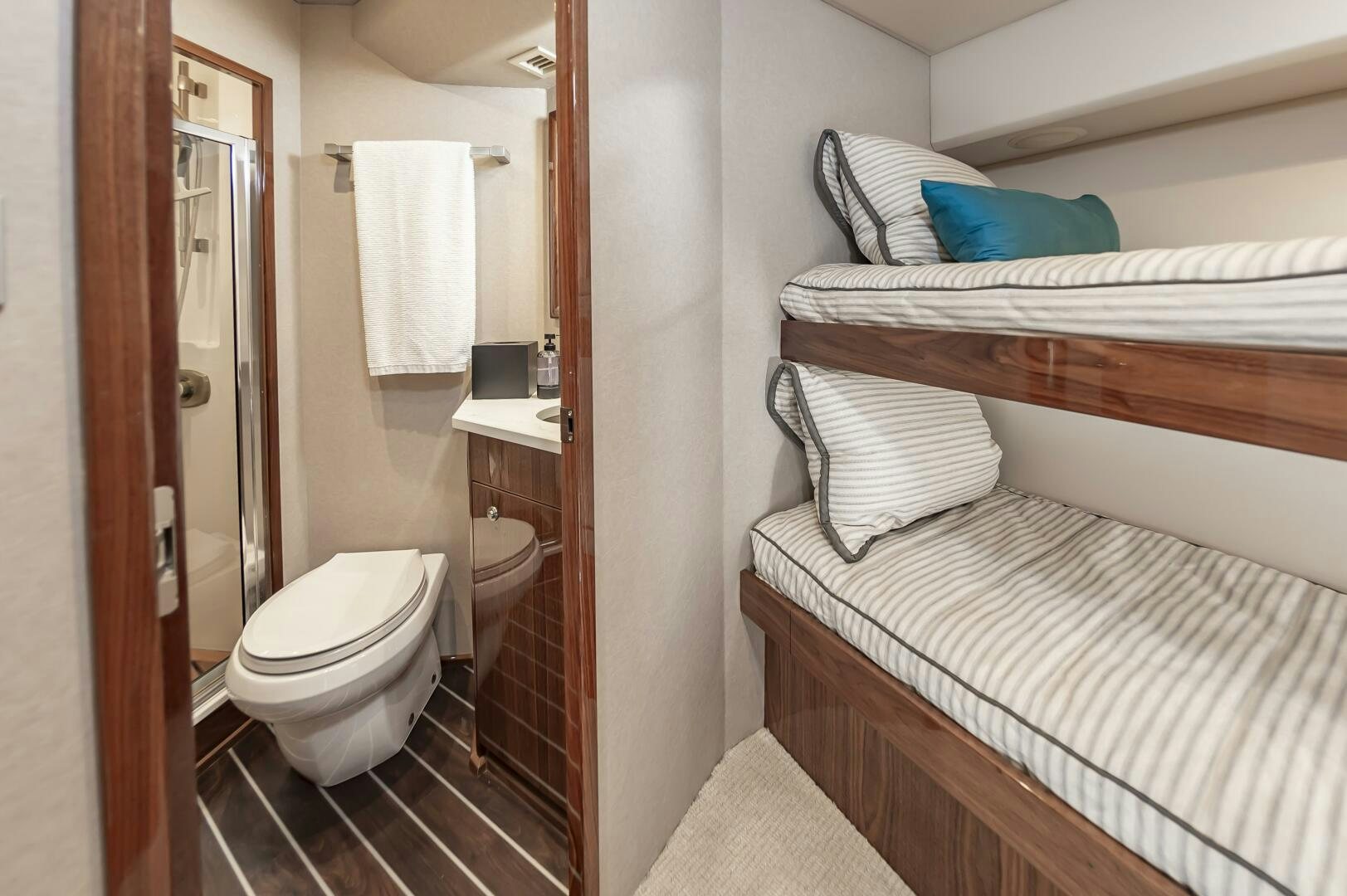 a small bathroom with a bed aboard MERCENARIA Yacht for Sale