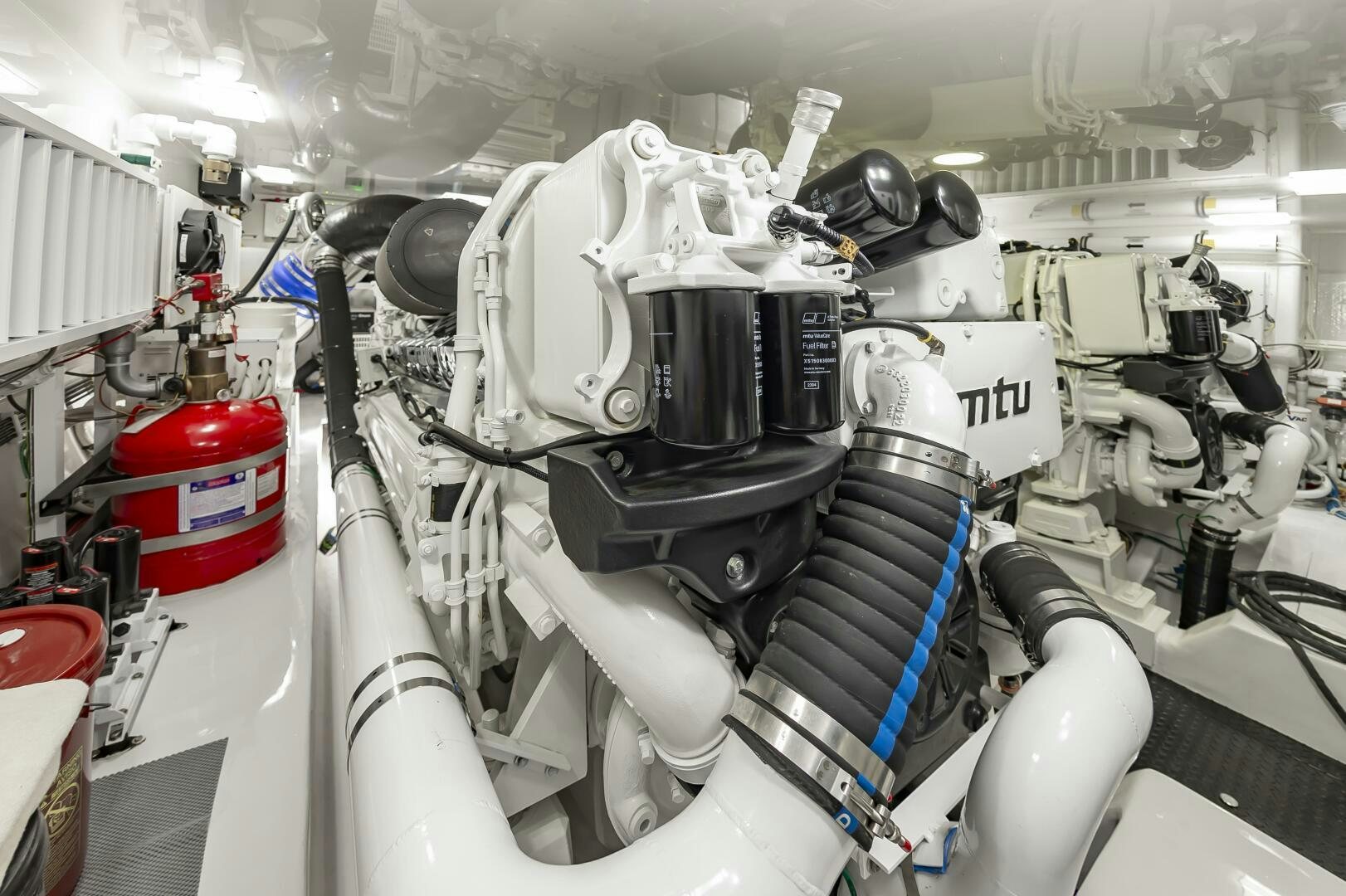 a car engine with a red and white hood aboard MERCENARIA Yacht for Sale