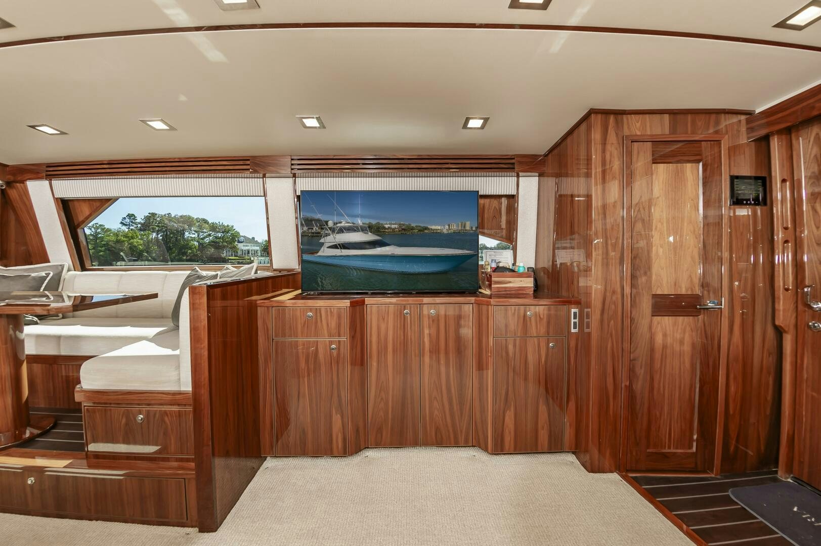 a room with a large wooden closet aboard MERCENARIA Yacht for Sale