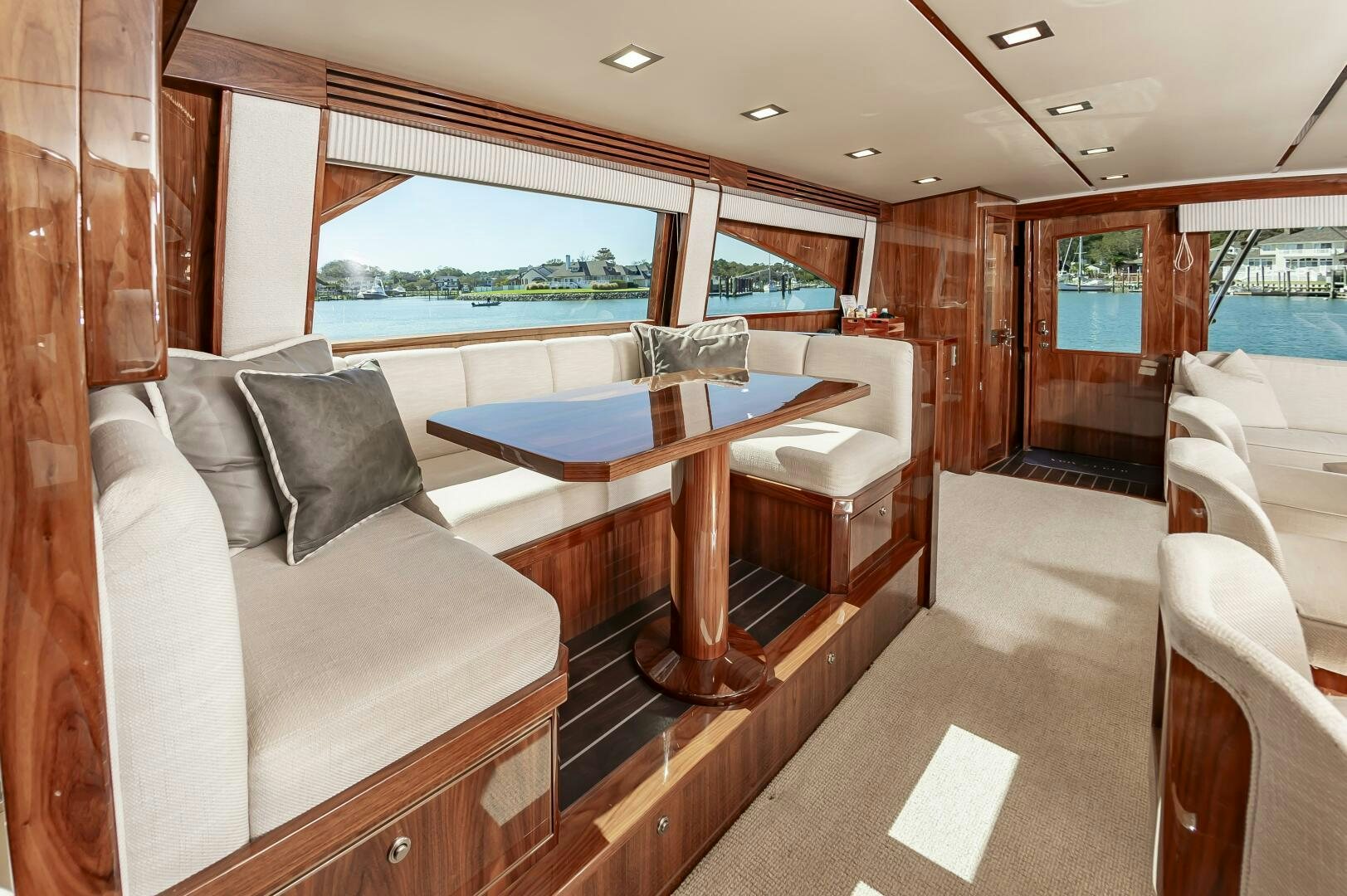 a room with a bed and a table aboard MERCENARIA Yacht for Sale