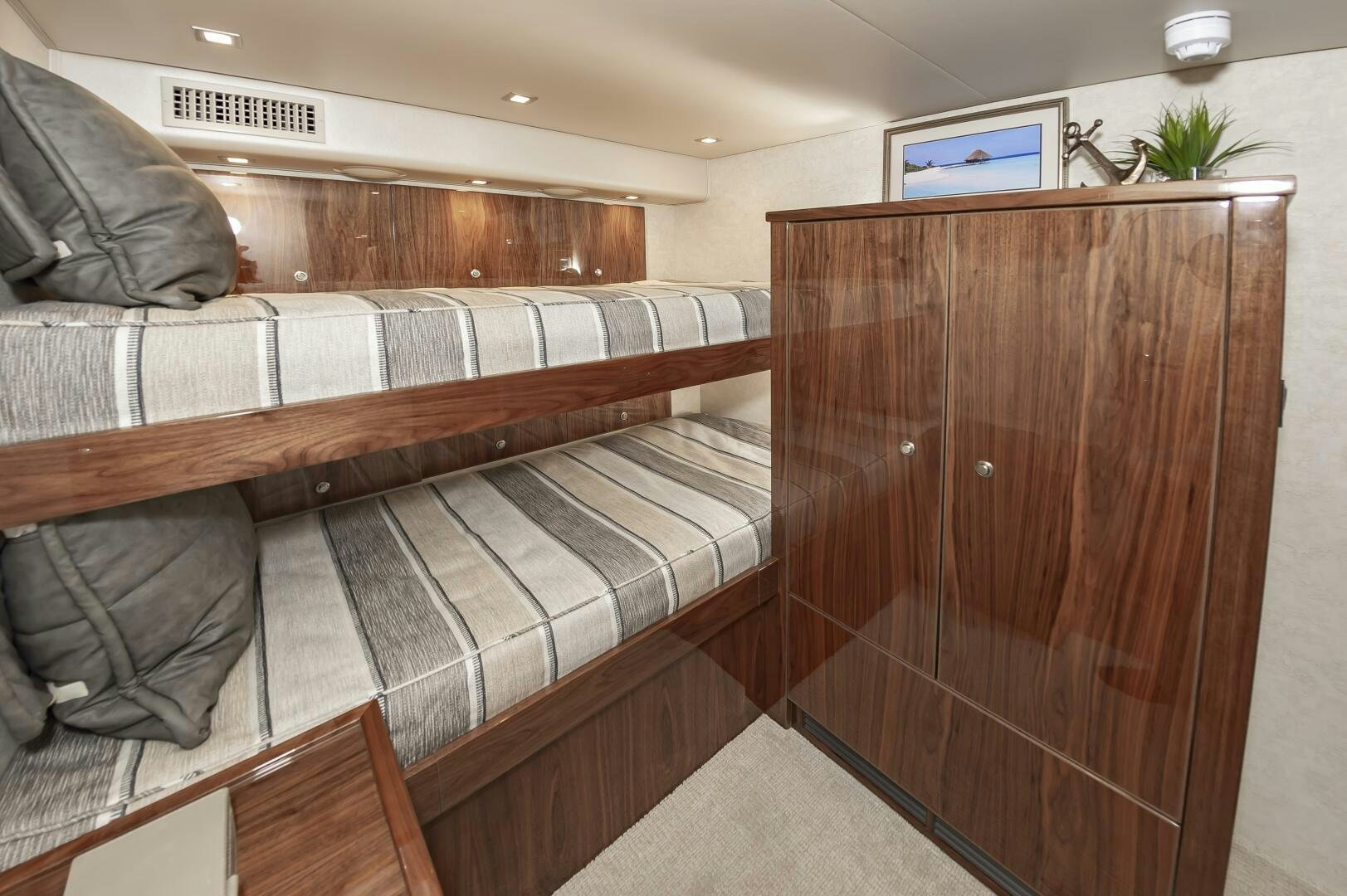a couch and a television in a room aboard MERCENARIA Yacht for Sale