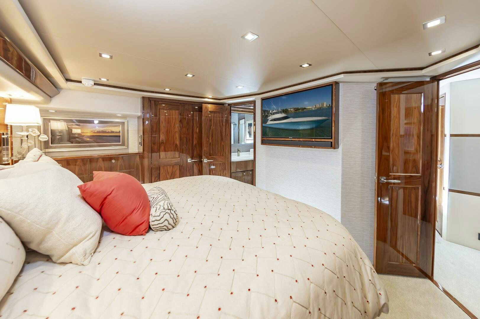 a large bed in a hotel room aboard MERCENARIA Yacht for Sale