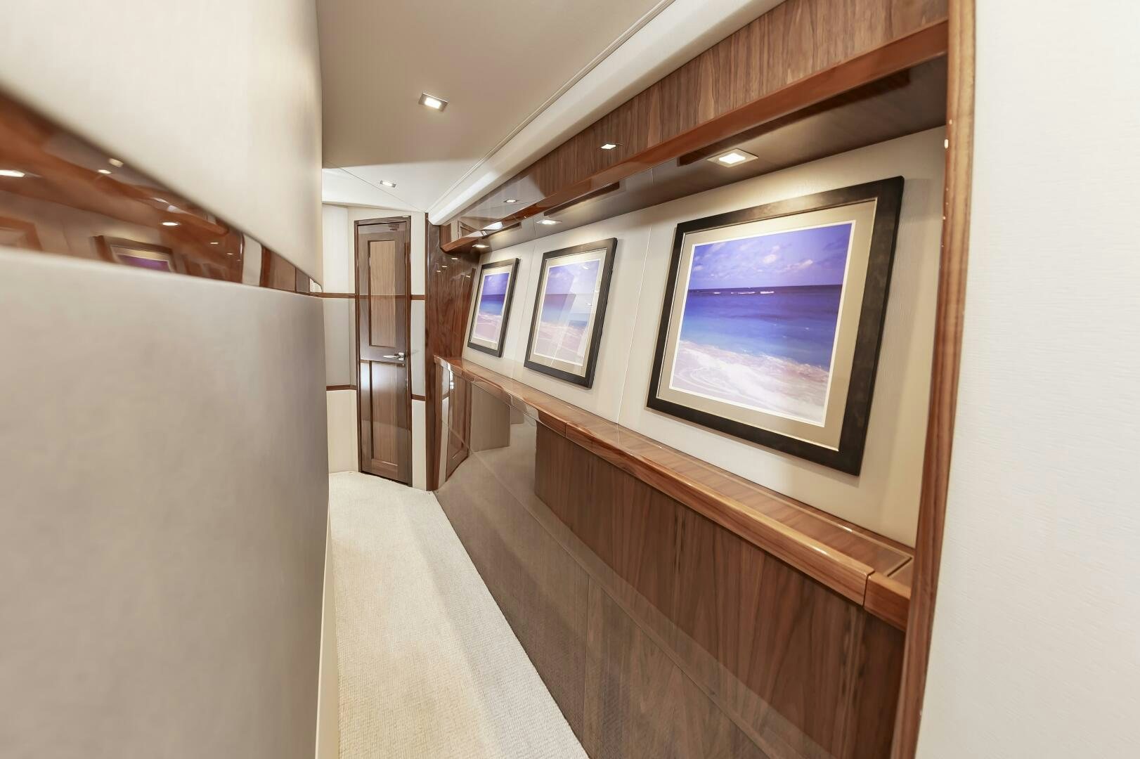 a room with a tv on the wall aboard MERCENARIA Yacht for Sale
