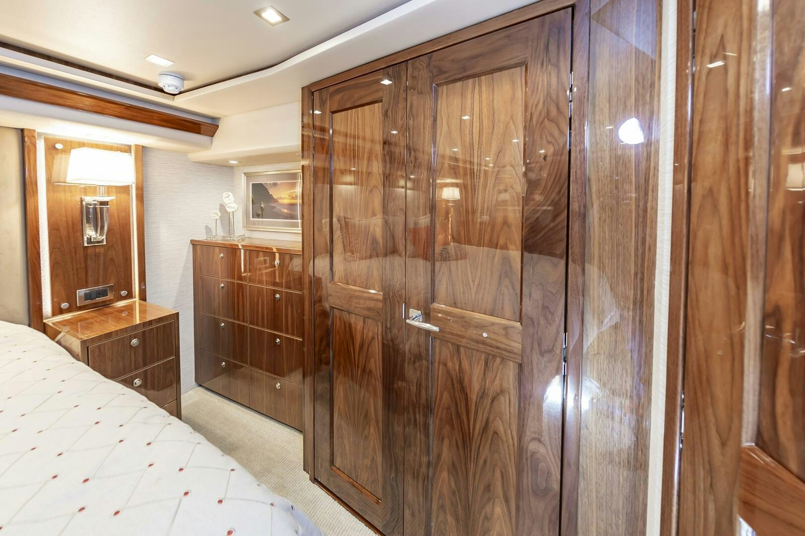 a room with wooden cabinets aboard MERCENARIA Yacht for Sale