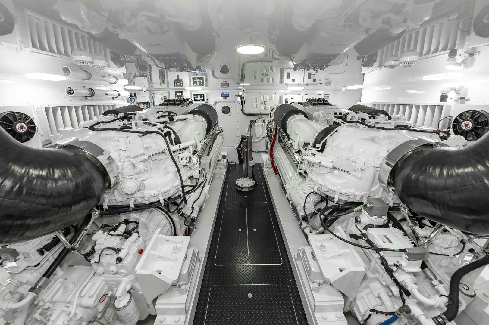 a room with a large vehicle aboard MERCENARIA Yacht for Sale