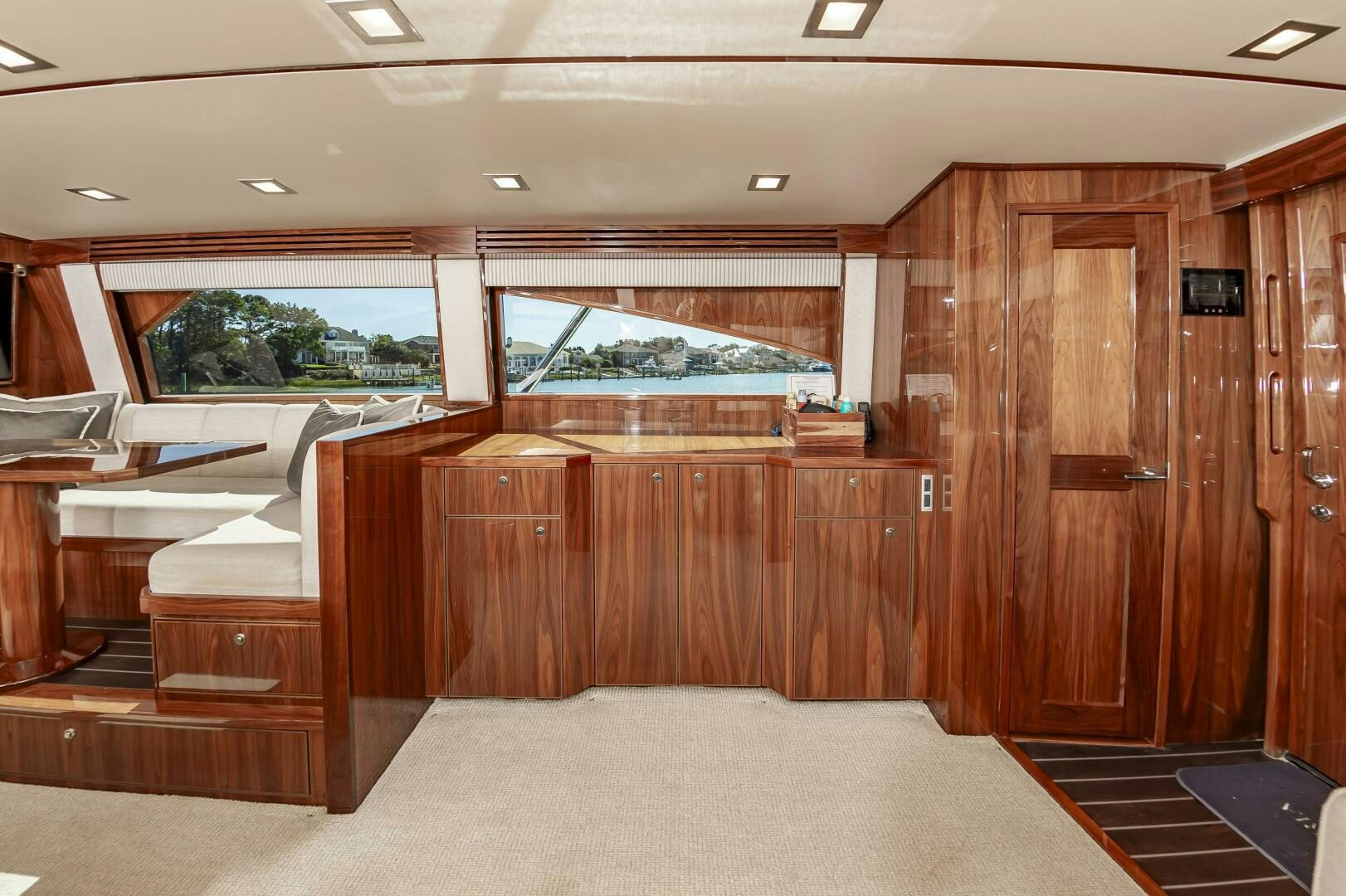 a room with wooden cabinets aboard MERCENARIA Yacht for Sale