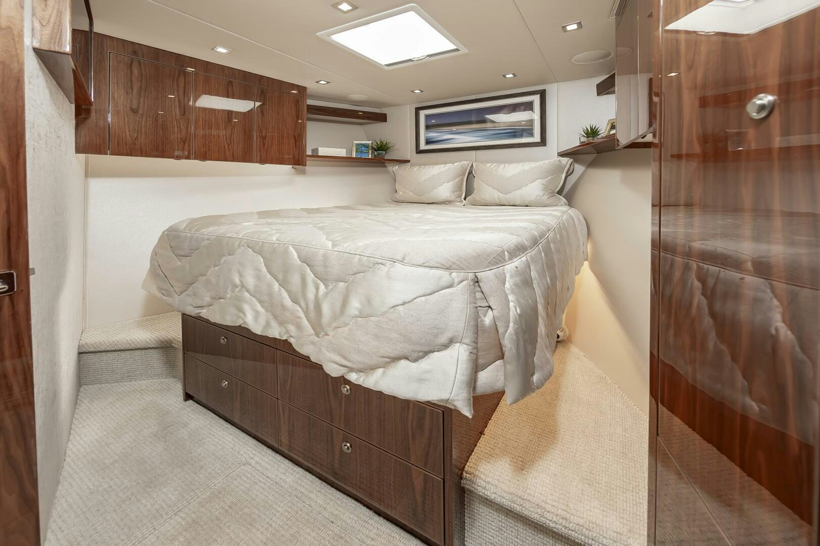 a room with a bed and a television aboard MERCENARIA Yacht for Sale