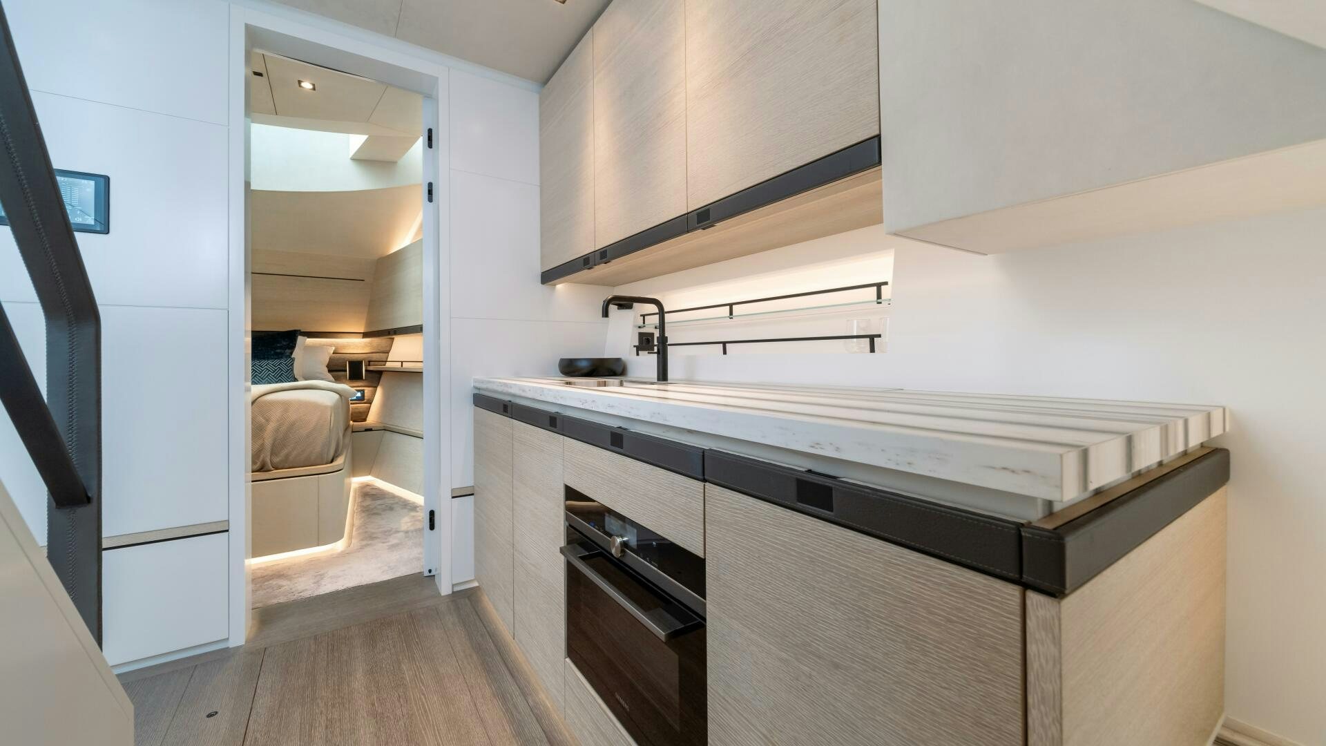 a kitchen with a sink and cabinets aboard FELLOWSHIP II Yacht for Sale