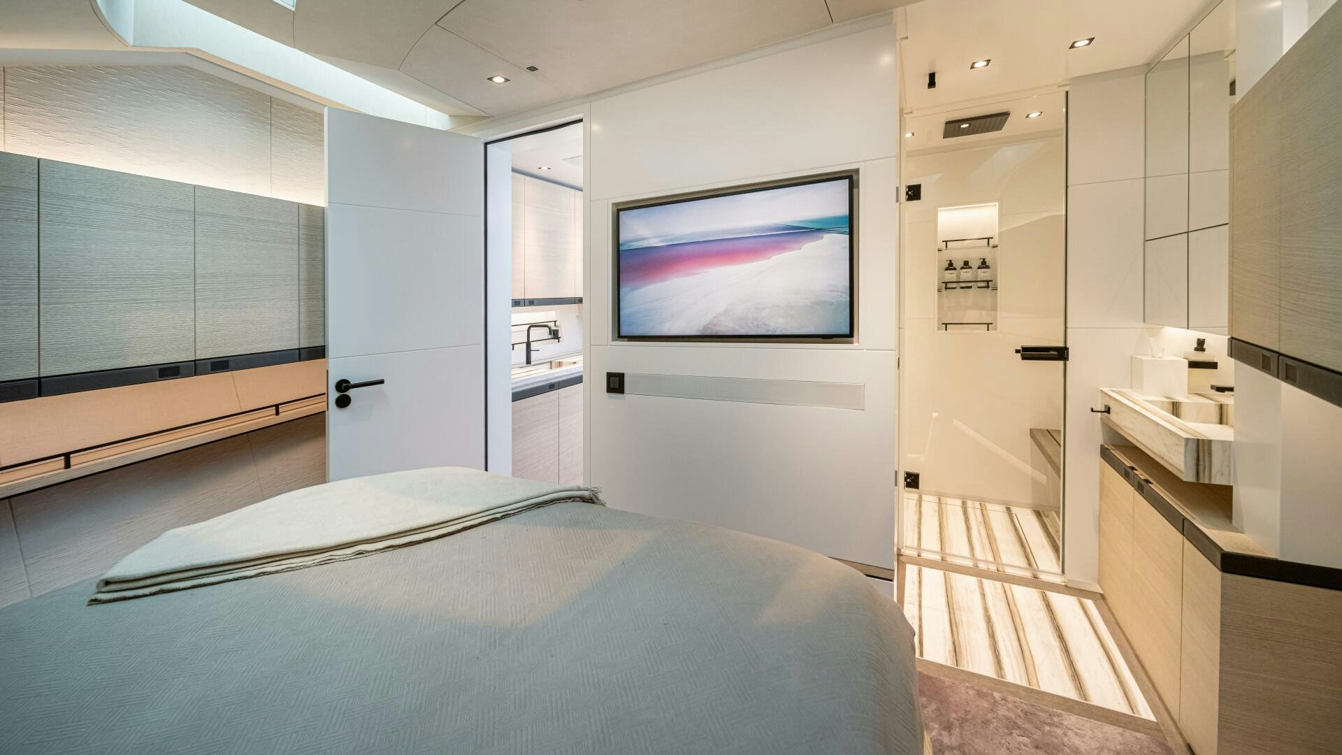 a room with a bed and a tv aboard FELLOWSHIP II Yacht for Sale