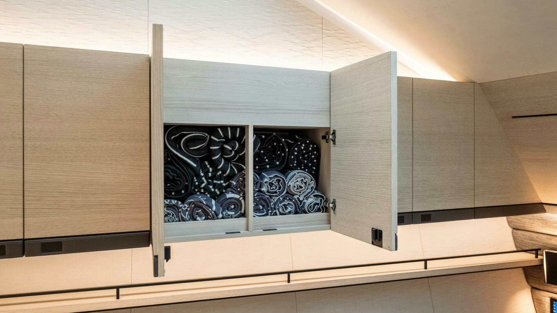 a cabinet with glass doors aboard FELLOWSHIP II Yacht for Sale