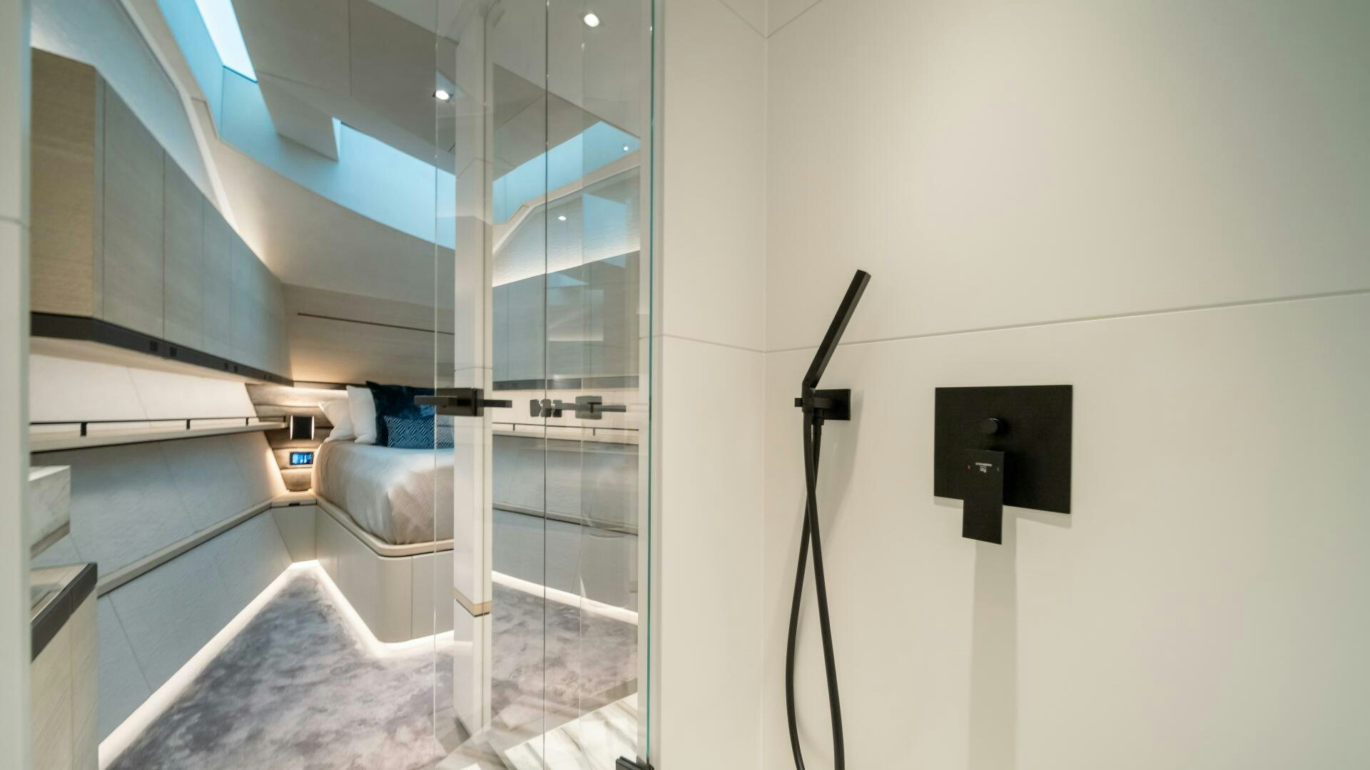 a bathroom with a glass shower aboard FELLOWSHIP II Yacht for Sale