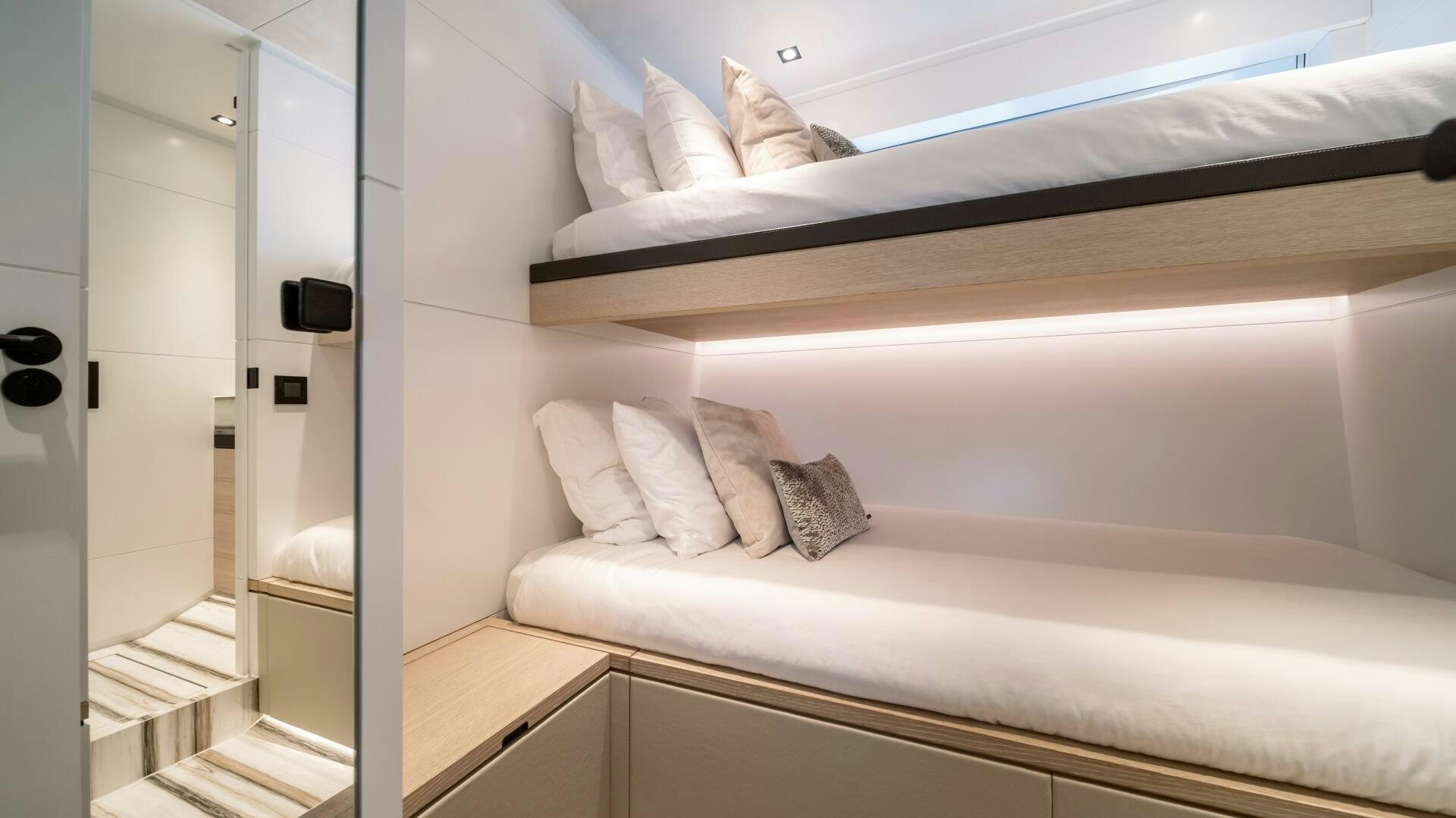 a bed with a white sheet aboard FELLOWSHIP II Yacht for Sale