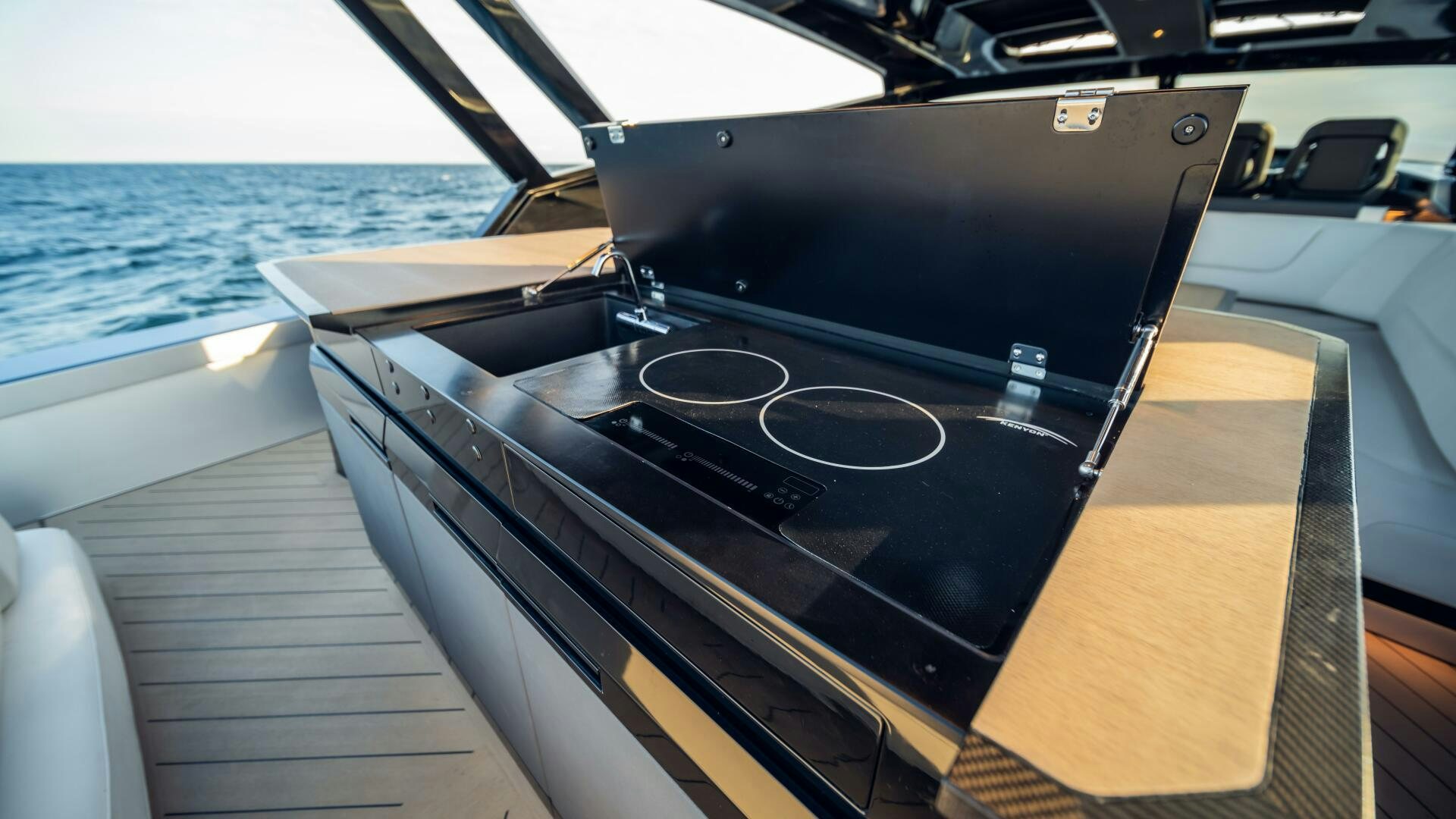 a black and silver piano on a boat aboard FELLOWSHIP II Yacht for Sale