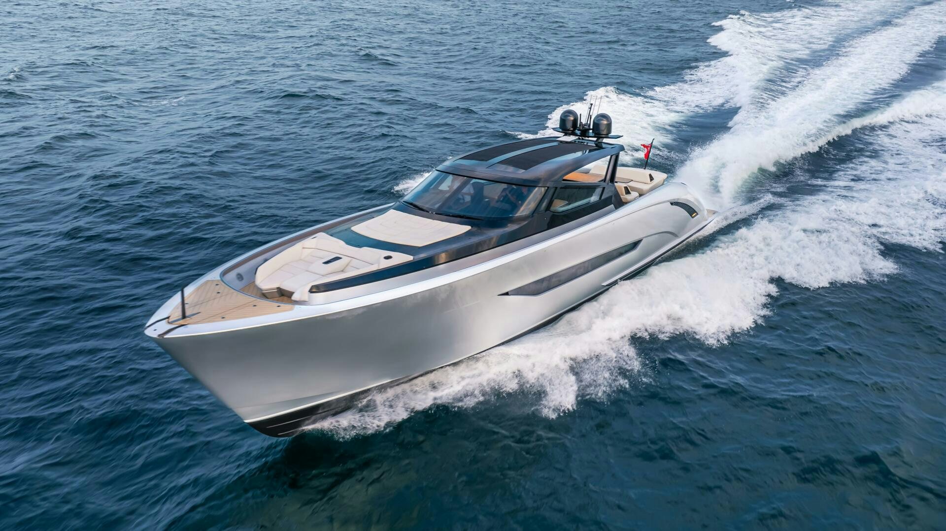 a white boat on the water aboard FELLOWSHIP II Yacht for Sale