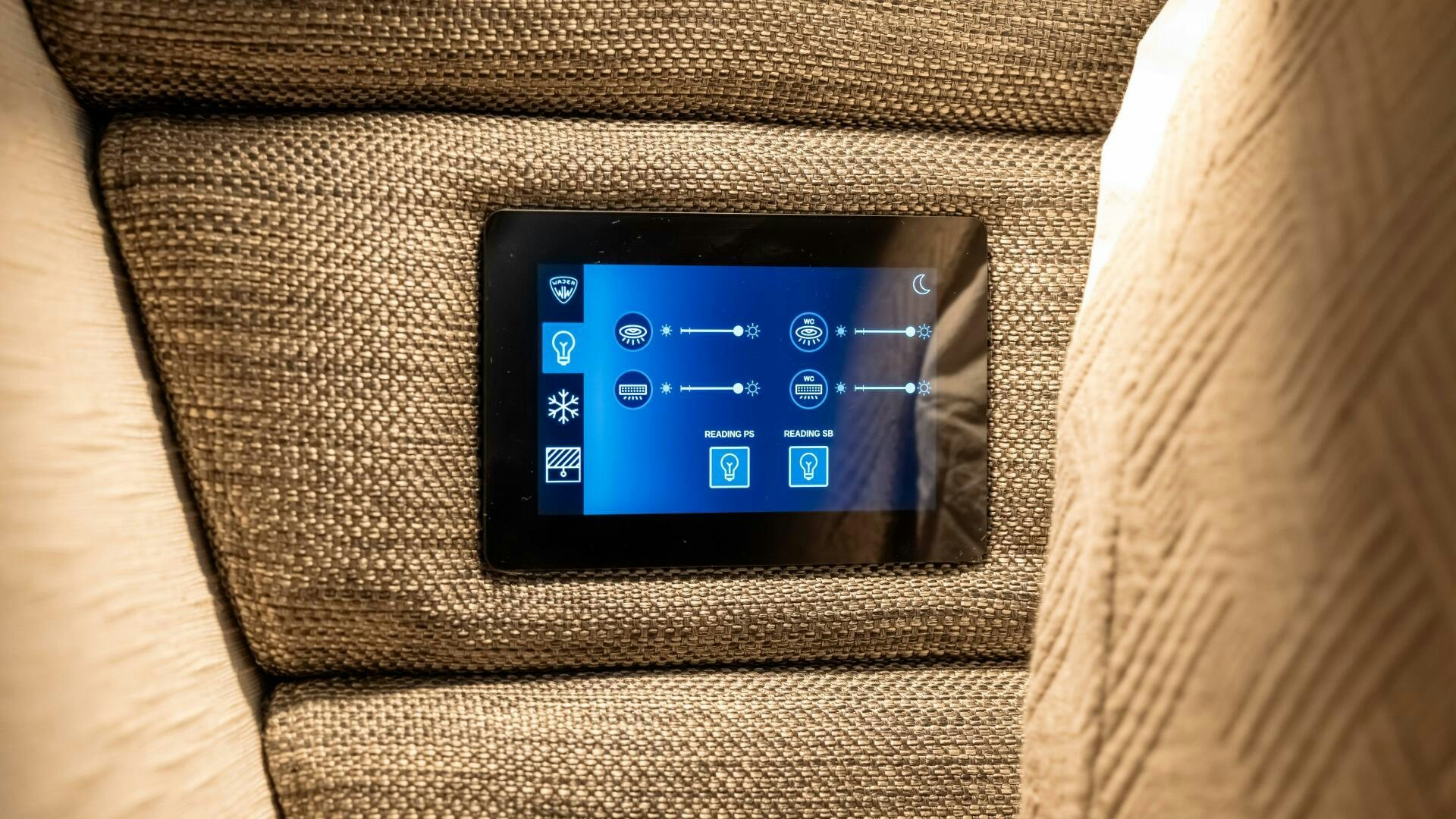 a black rectangular electronic device aboard FELLOWSHIP II Yacht for Sale