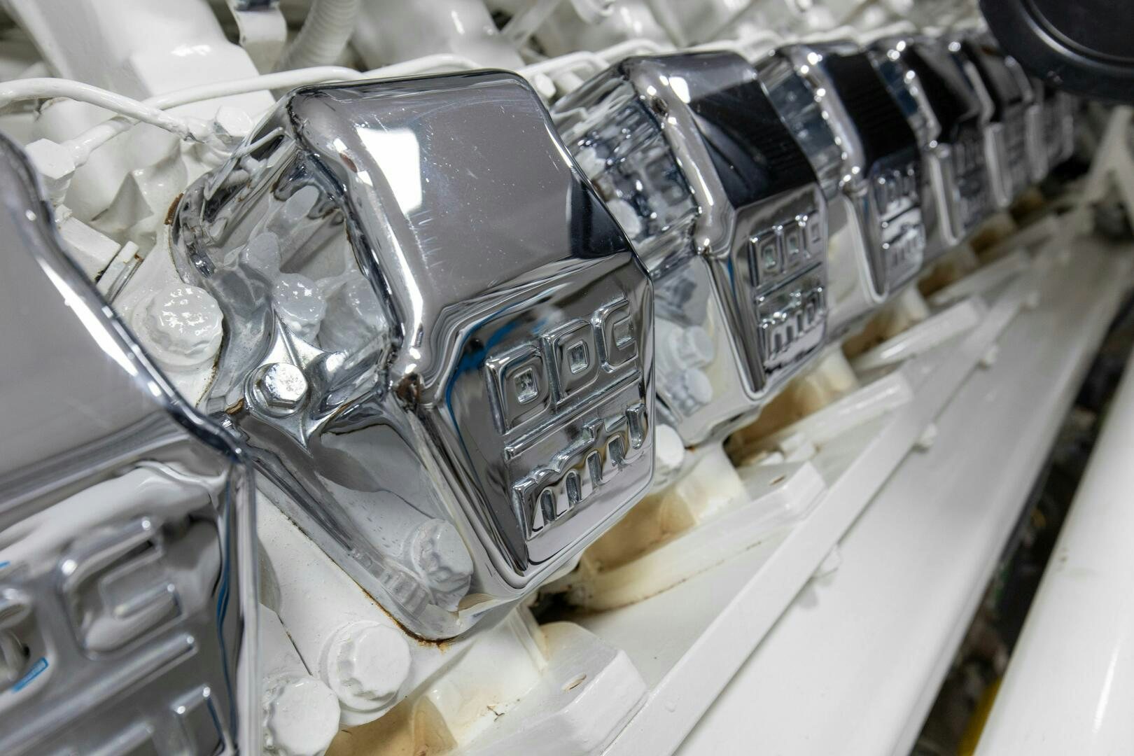 a car engine with its hood open aboard JESSI SUE Yacht for Sale