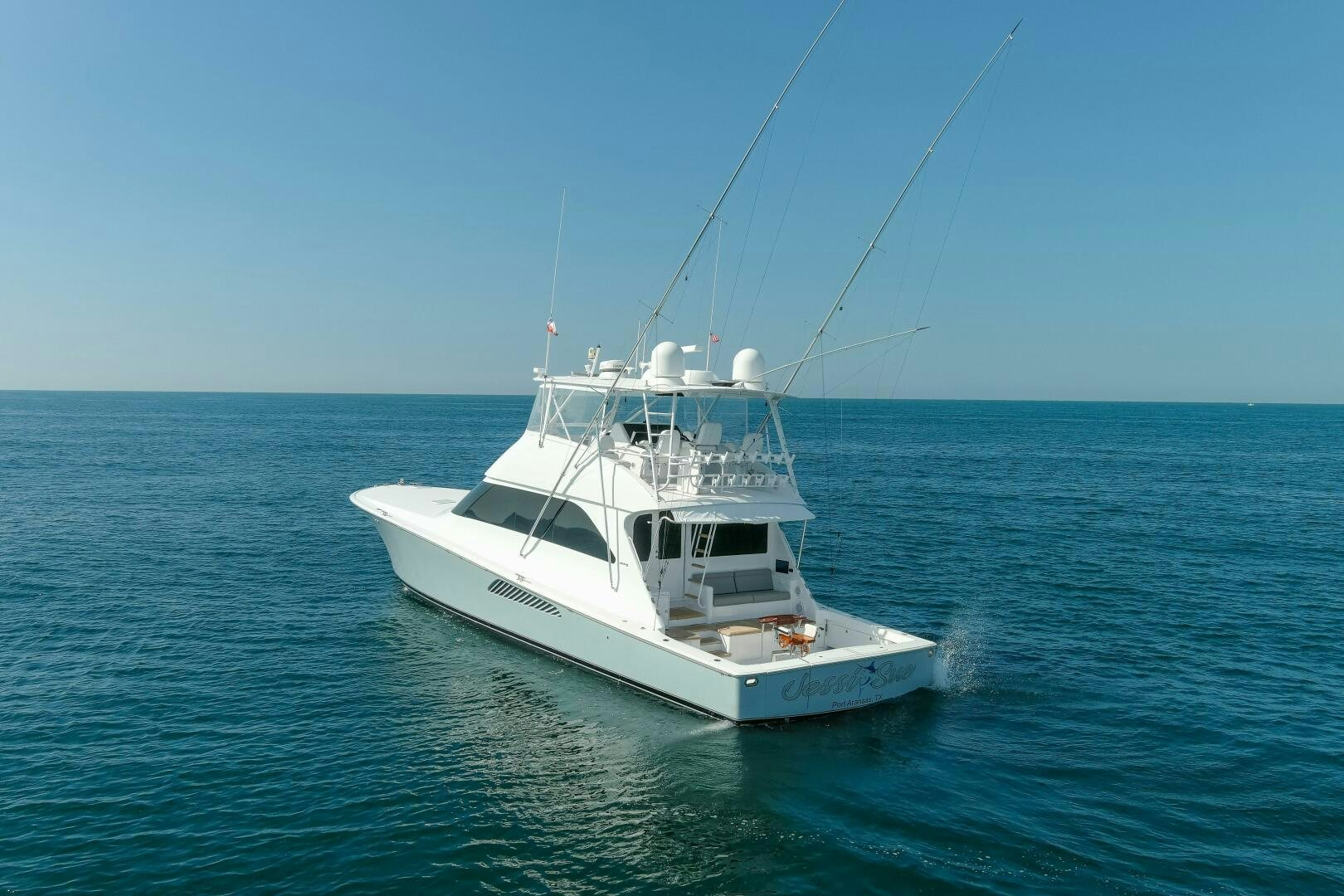 a white boat in the water aboard JESSI SUE Yacht for Sale