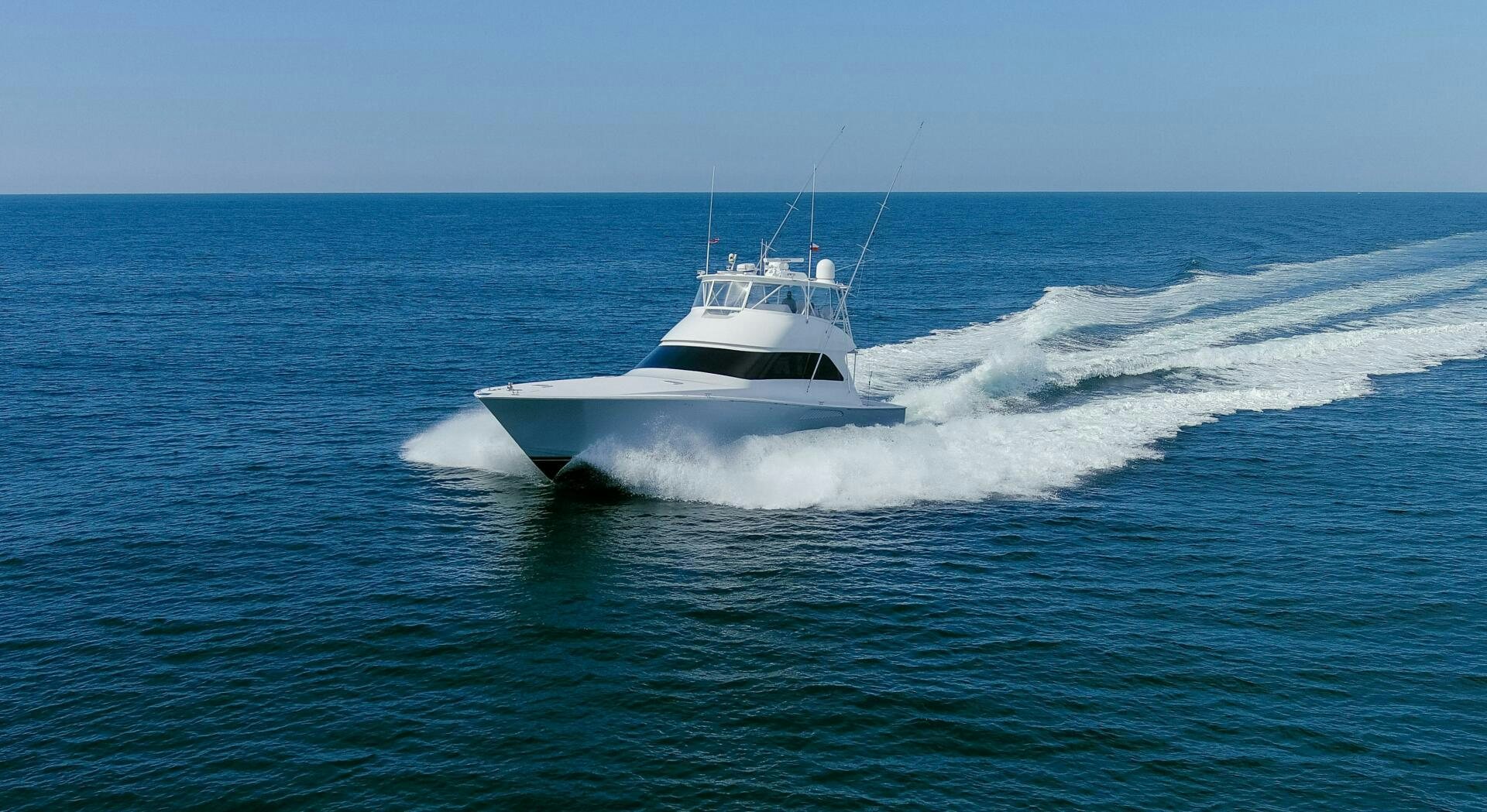 a white boat on the water aboard JESSI SUE Yacht for Sale