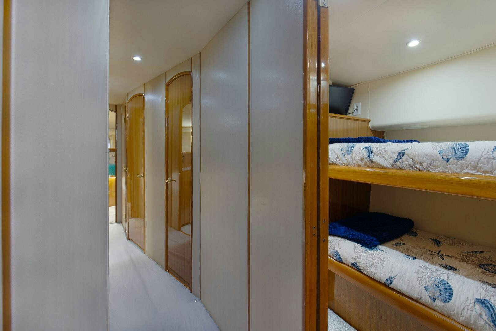 a room with bunk beds aboard JESSI SUE Yacht for Sale