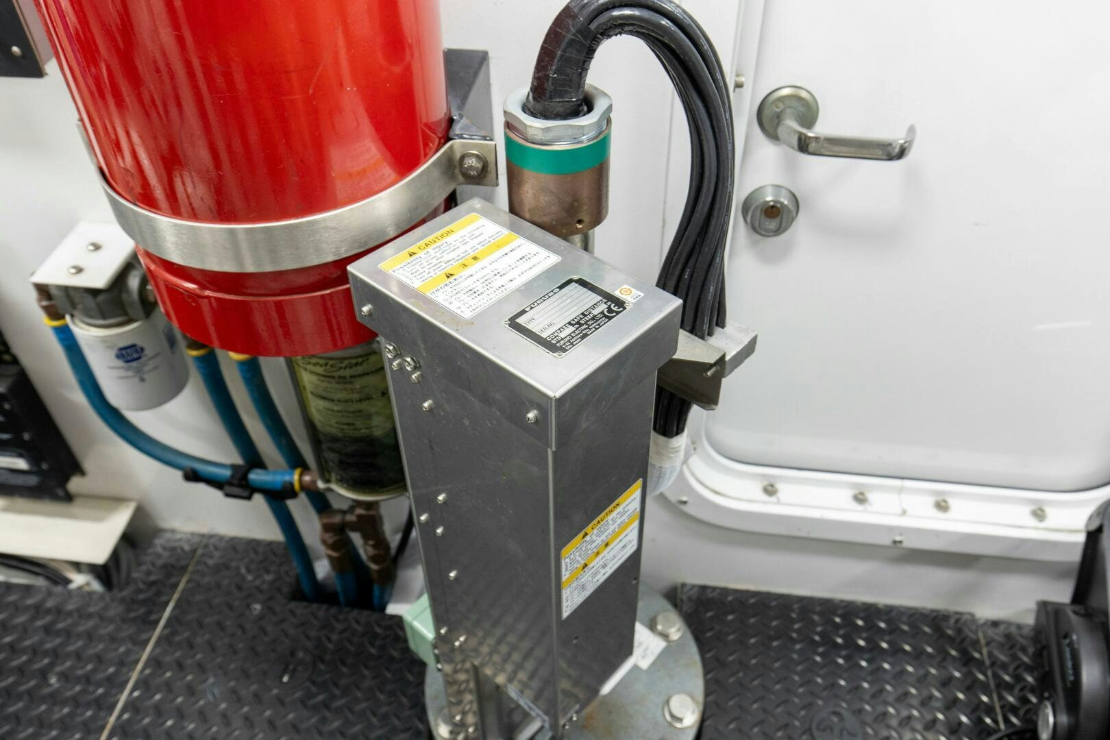 a machine with a red and green cap aboard JESSI SUE Yacht for Sale