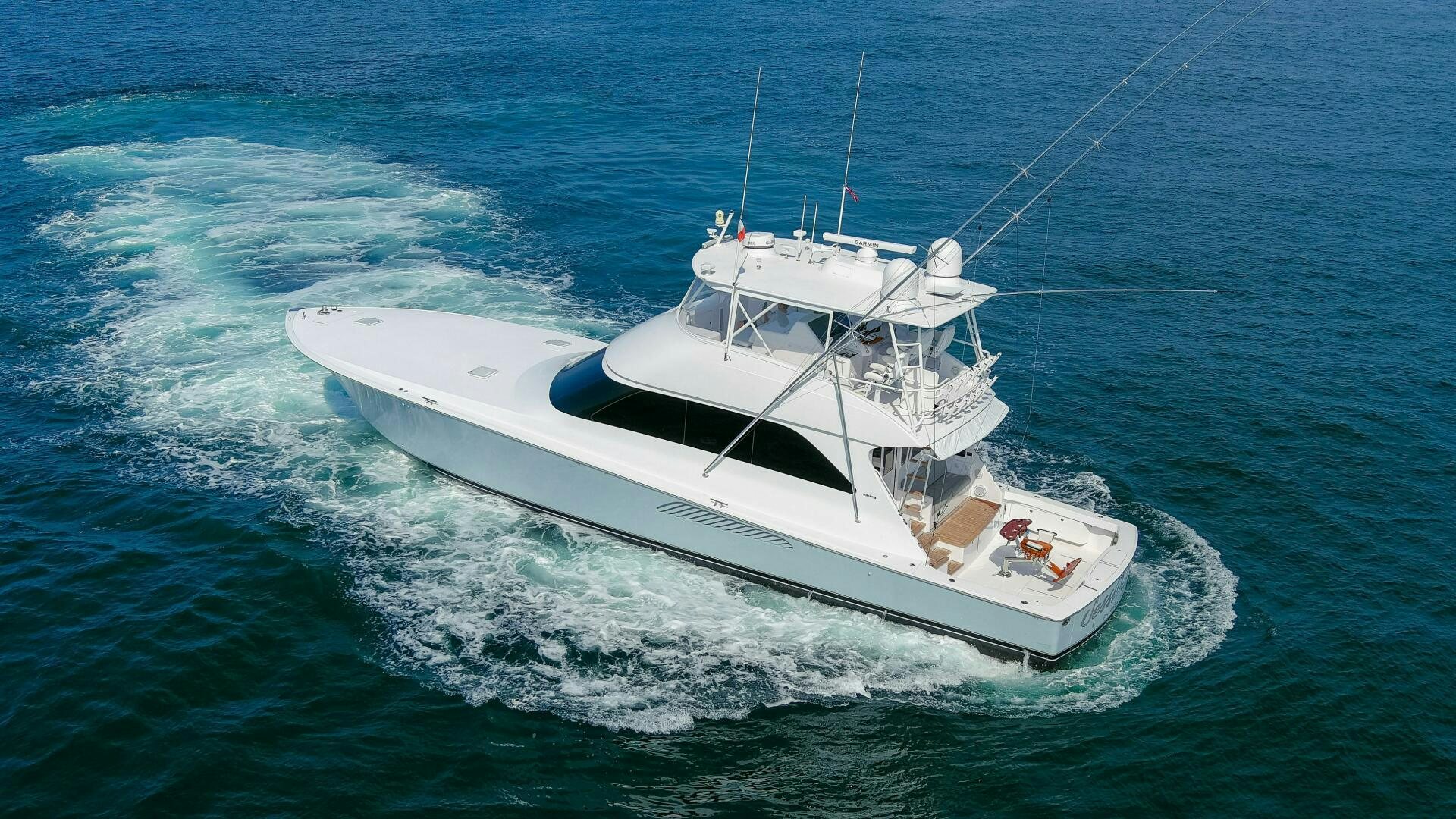 a white boat on the water aboard JESSI SUE Yacht for Sale
