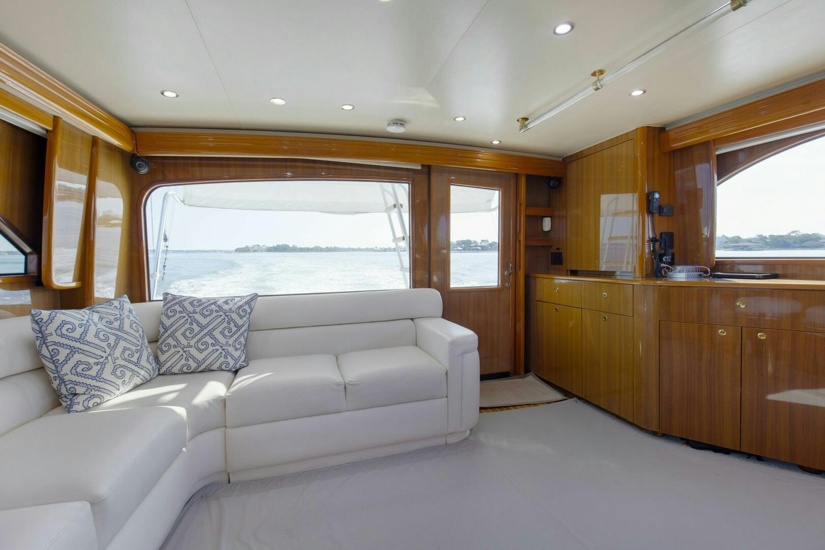 a living room with a couch aboard JESSI SUE Yacht for Sale