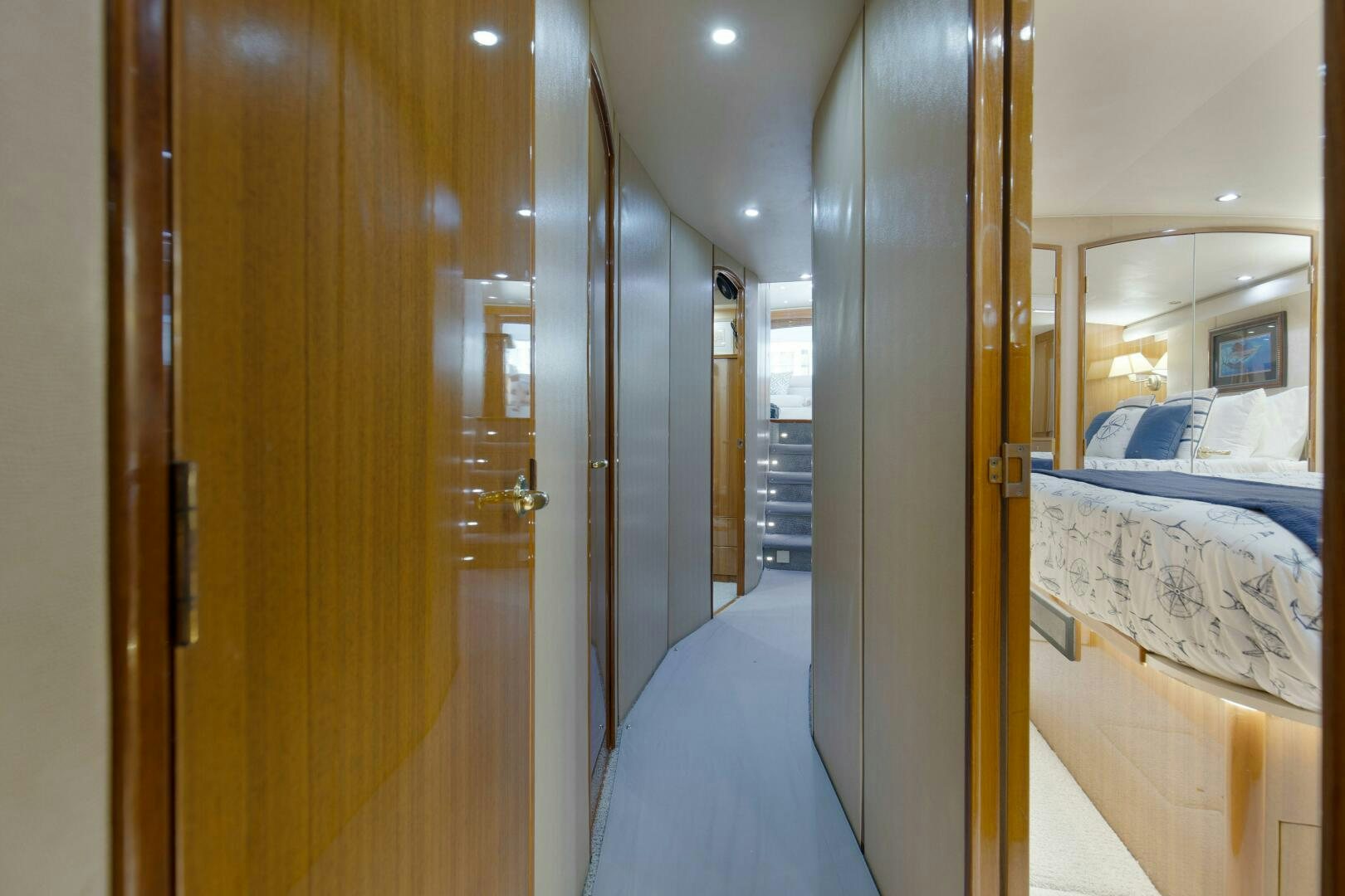 a room with a bed and a closet aboard JESSI SUE Yacht for Sale