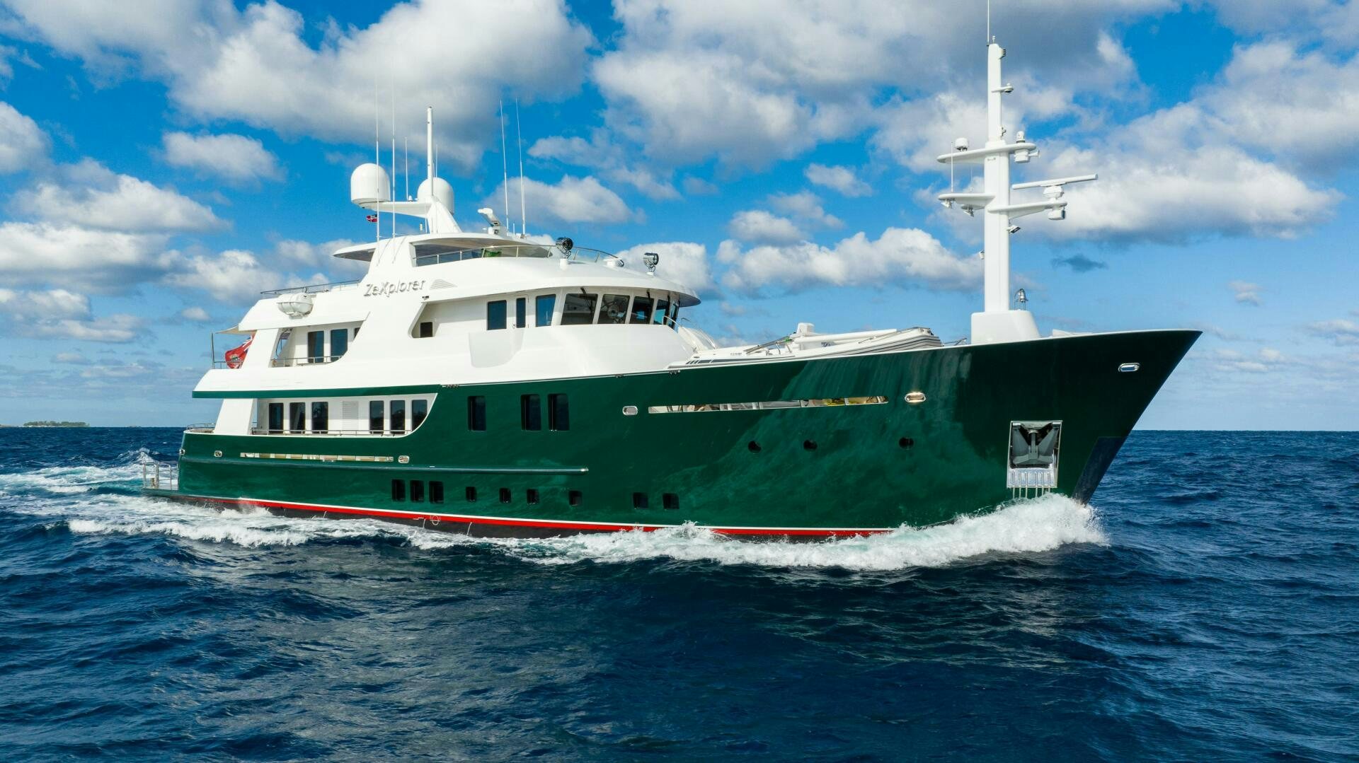 a large boat in the water aboard ZEXPLORER Yacht for Sale