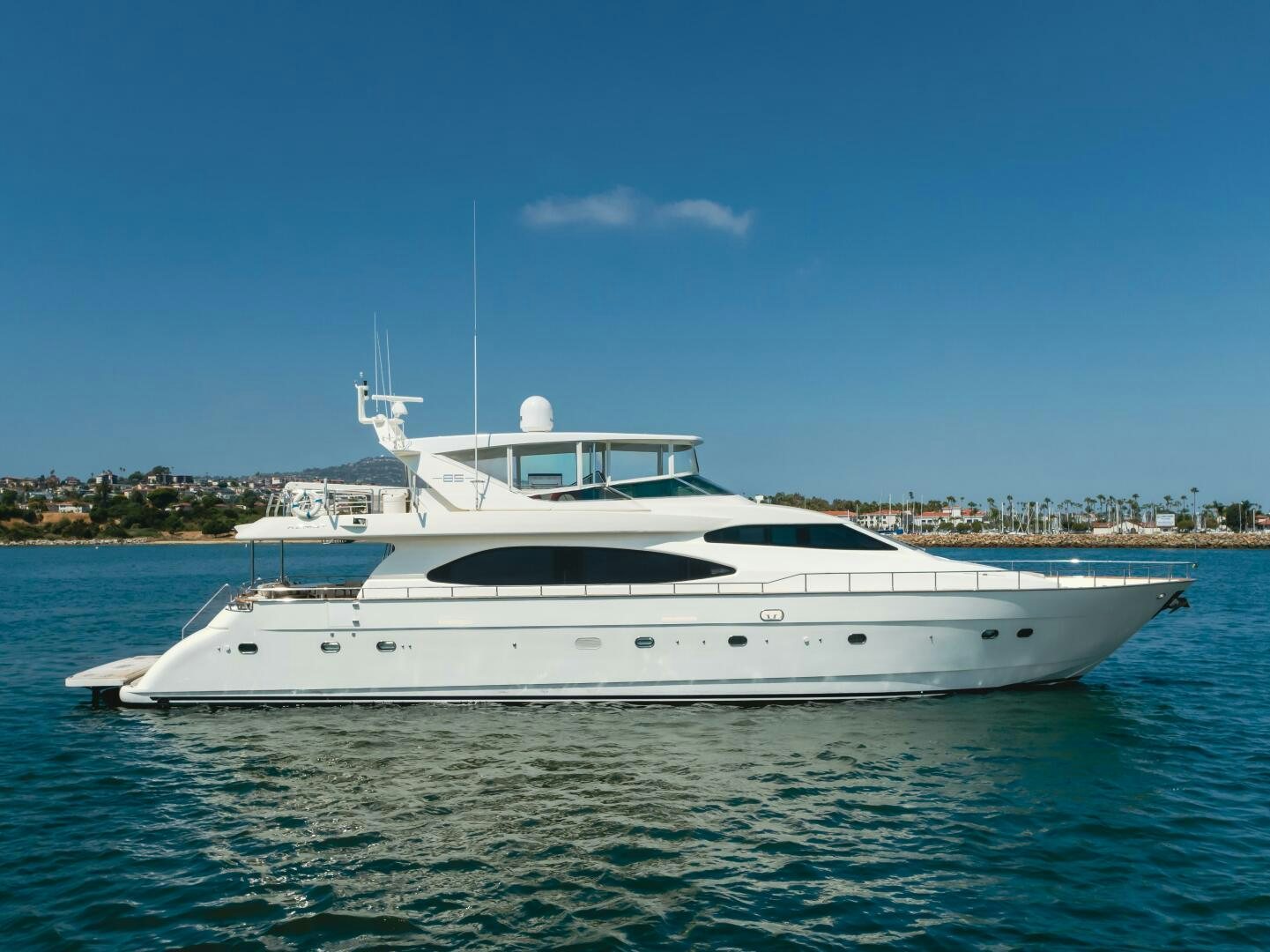 a white yacht in the water aboard ANEJO Yacht for Sale