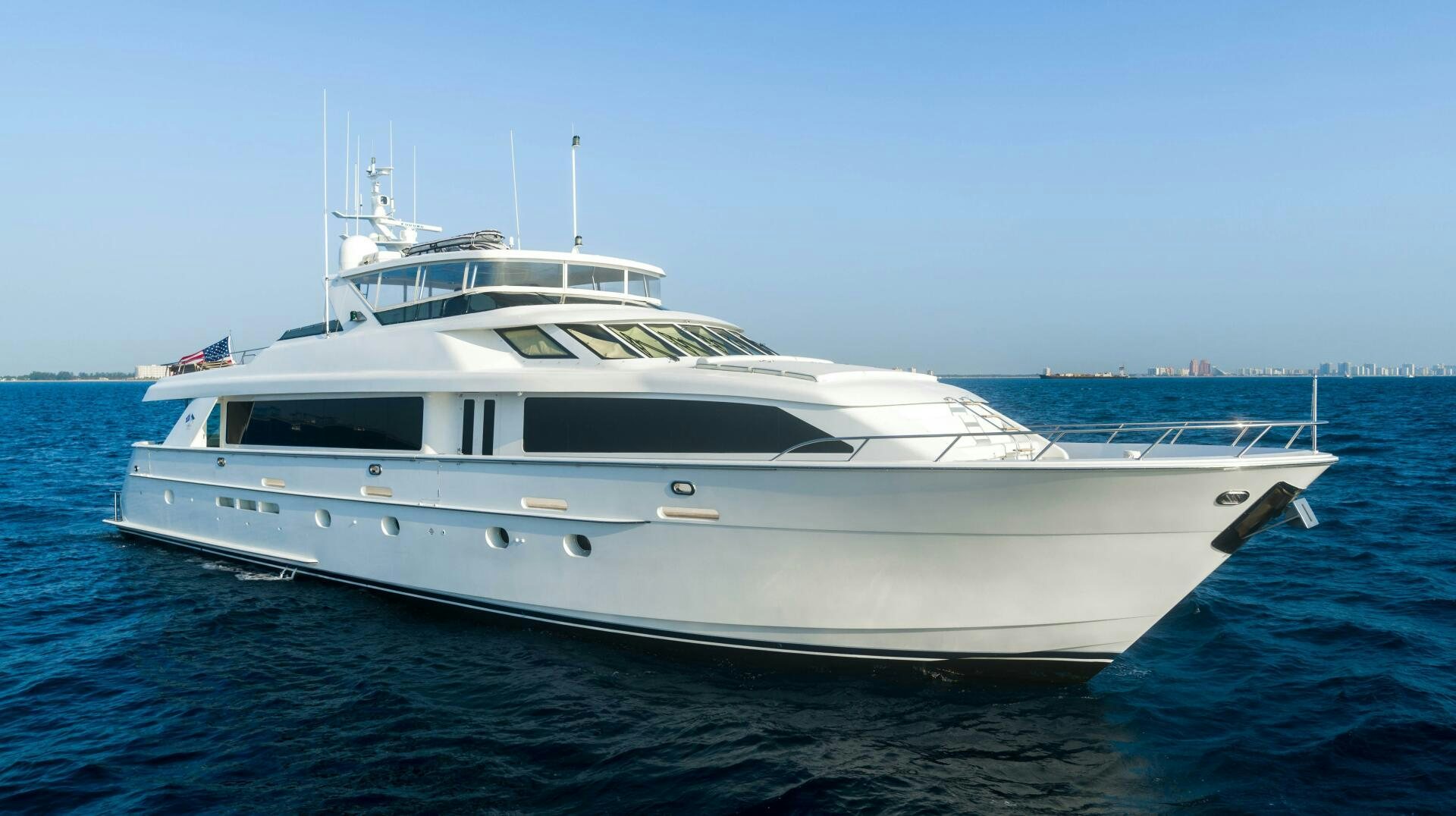 a white yacht on the water aboard INEVITABLE Yacht for Sale
