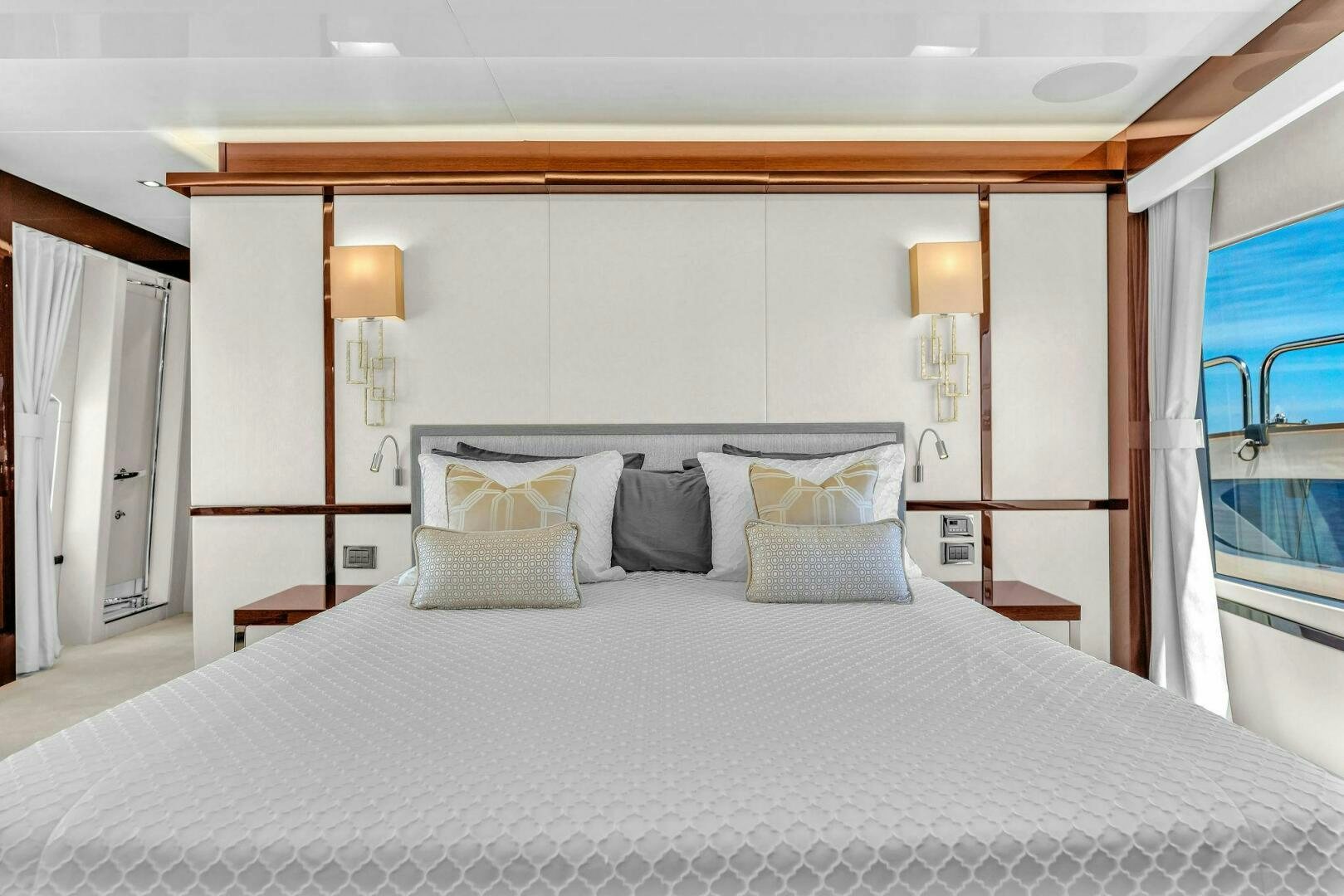 a bed with pillows aboard KARILLIAN & COMPANY Yacht for Sale