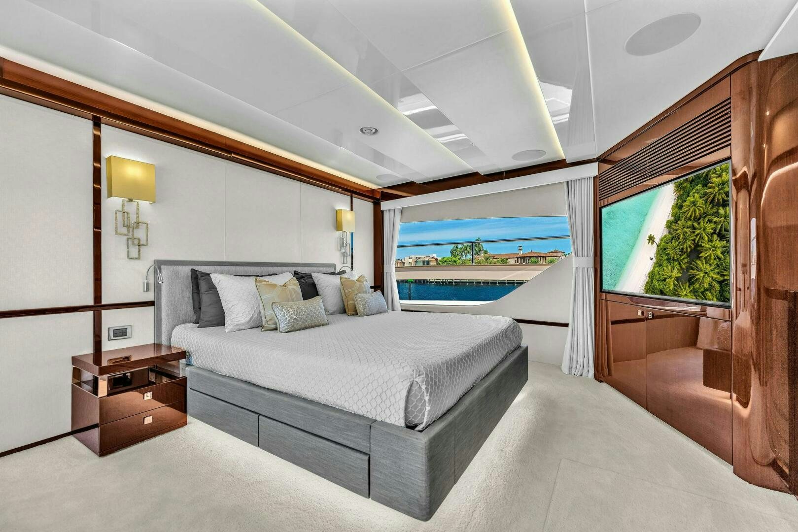 a large bedroom with a large bed aboard KARILLIAN & COMPANY Yacht for Sale