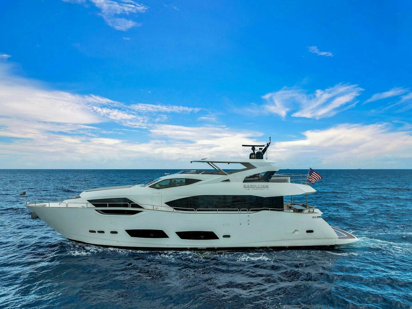 a white yacht in the water aboard KARILLIAN & COMPANY Yacht for Sale