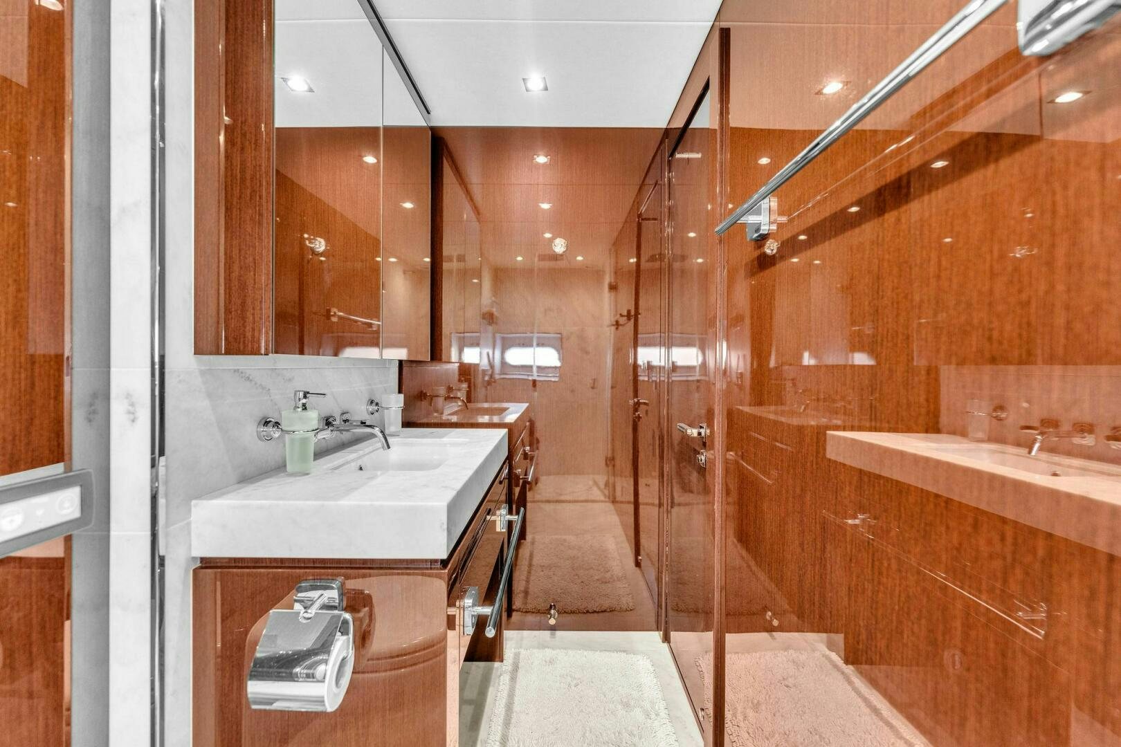 a bathroom with a sink and a shower aboard KARILLIAN & COMPANY Yacht for Sale