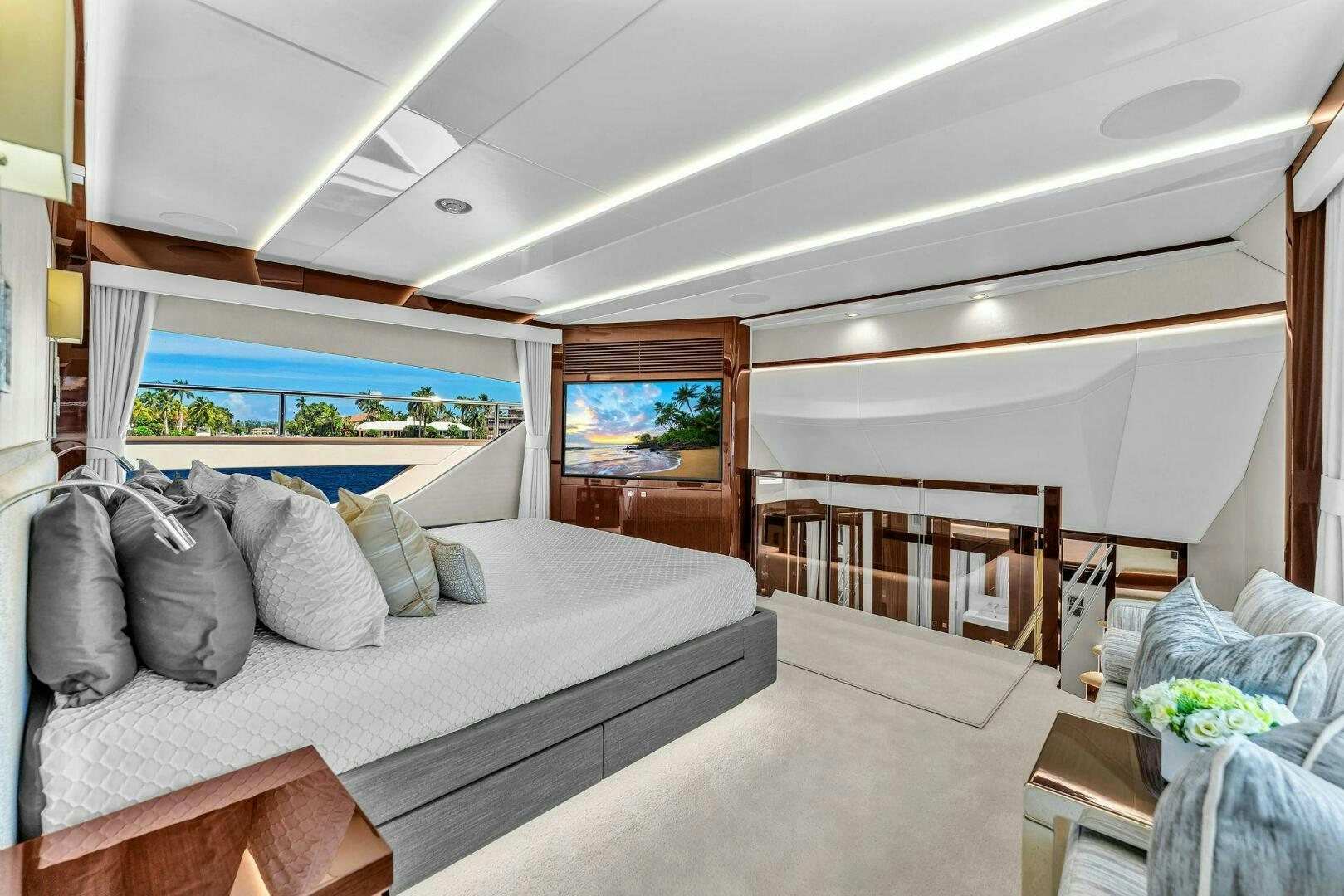 a room with a bed and a view of the ocean aboard KARILLIAN & COMPANY Yacht for Sale