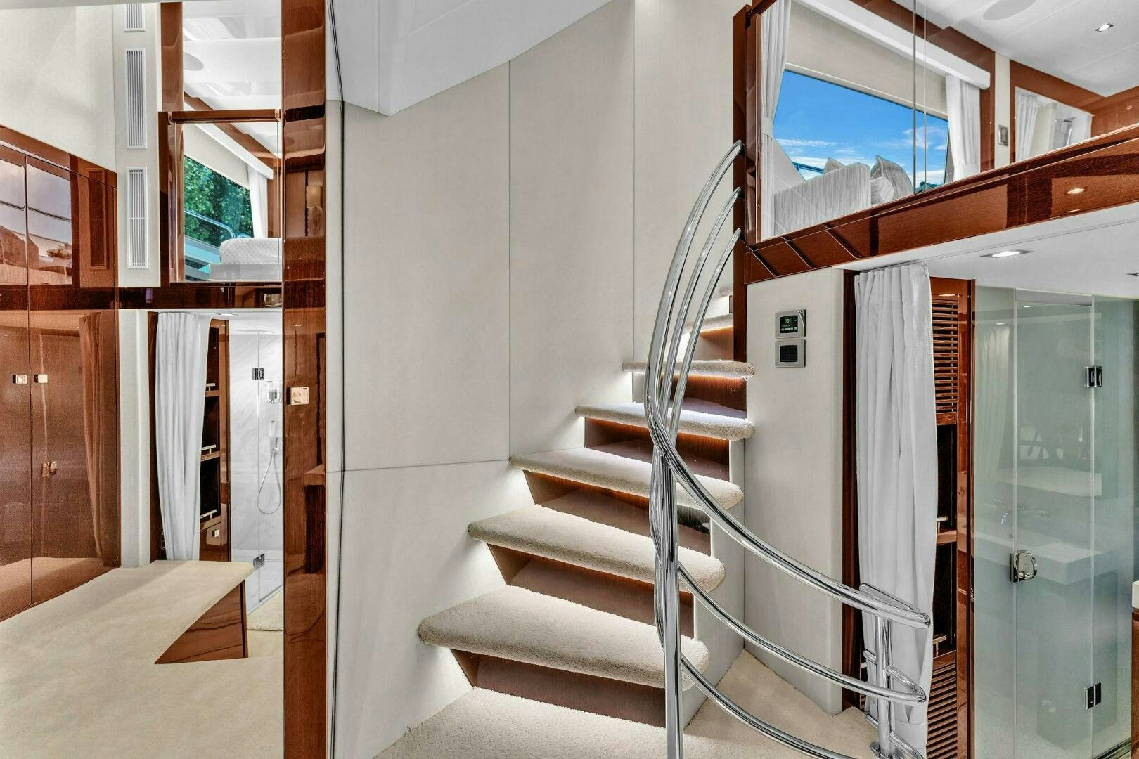 a staircase in a house aboard KARILLIAN & COMPANY Yacht for Sale