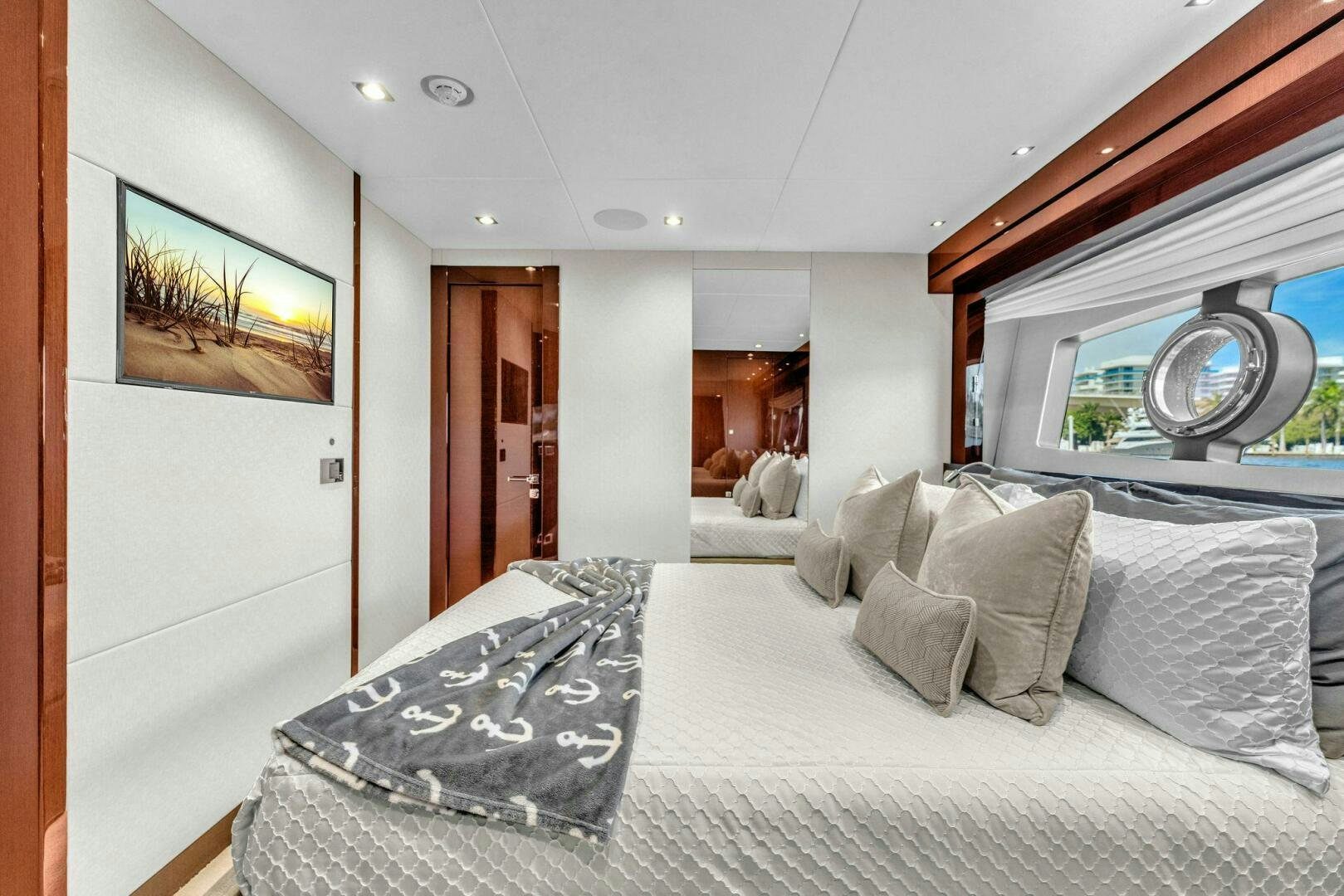 a bed with white sheets aboard KARILLIAN & COMPANY Yacht for Sale