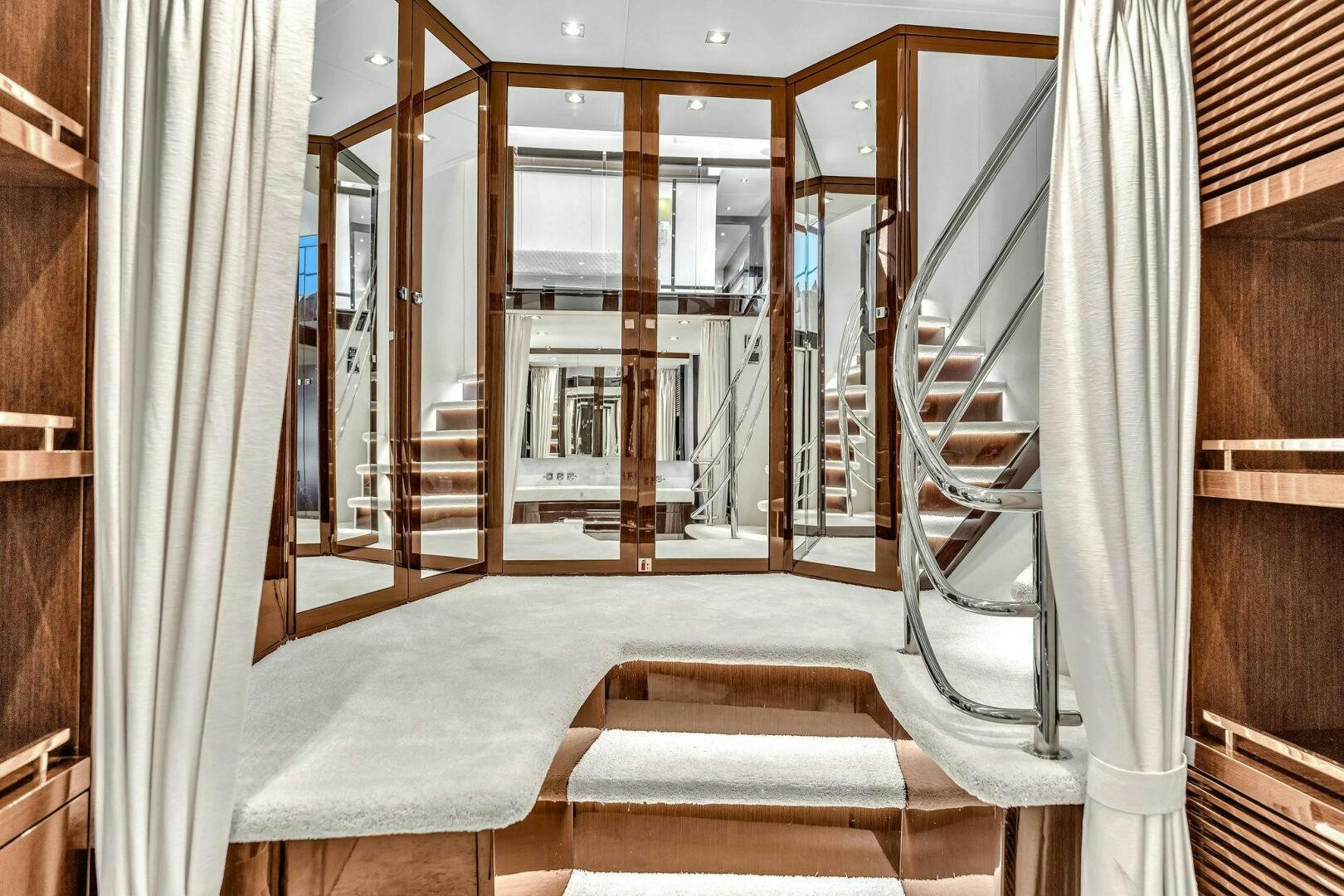 a hallway with a glass door aboard KARILLIAN & COMPANY Yacht for Sale