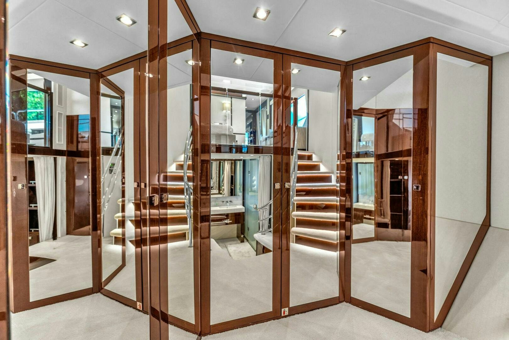 a room with glass doors aboard KARILLIAN & COMPANY Yacht for Sale