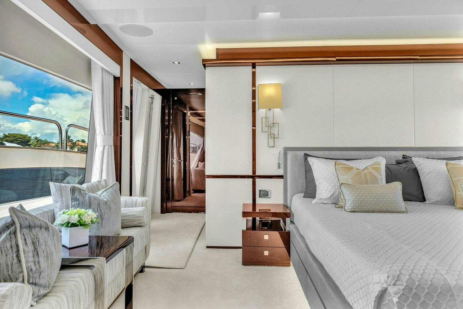 a bedroom with a large bed aboard KARILLIAN & COMPANY Yacht for Sale