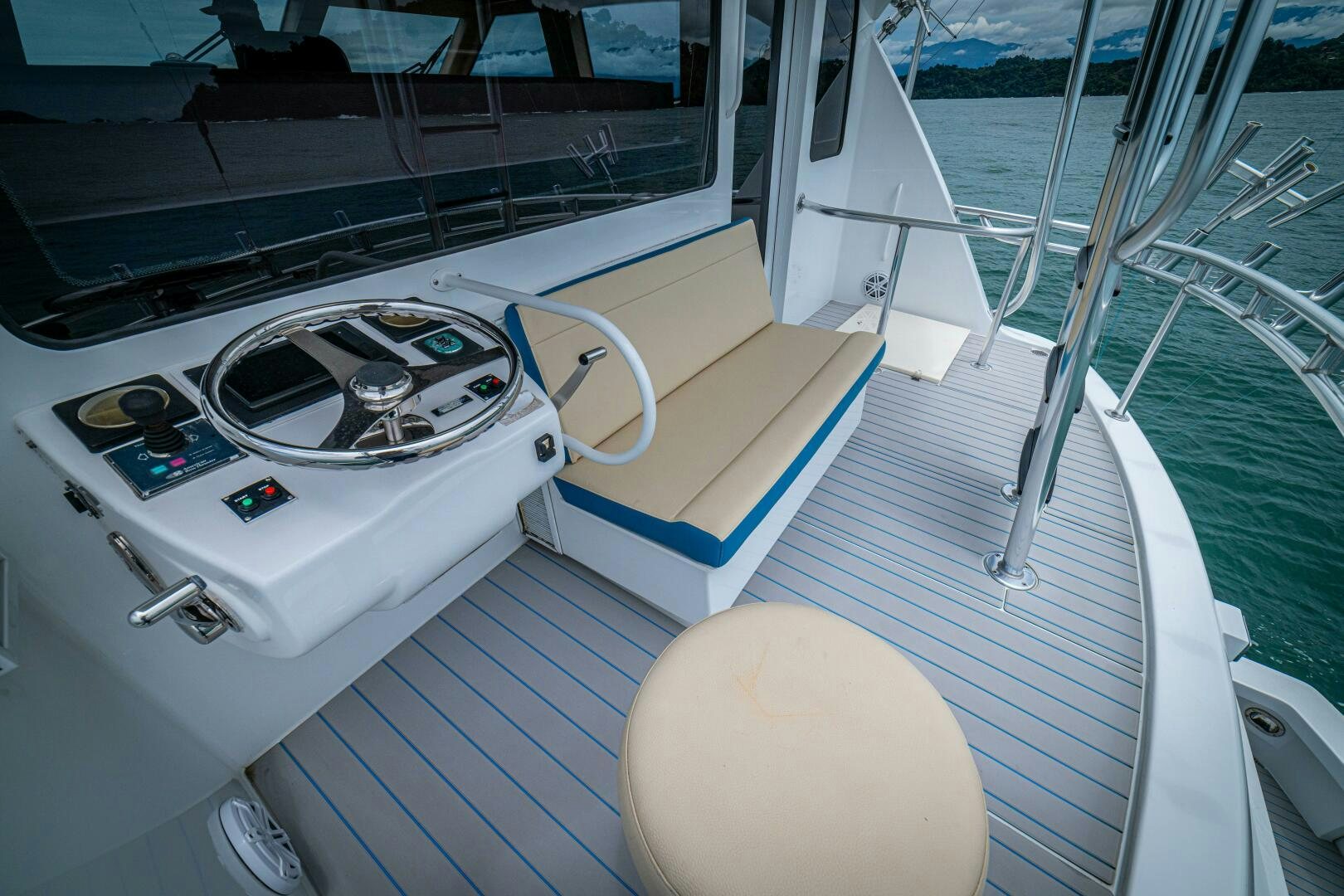 a boat with a seat and steering wheel aboard MARLIN CLIPPER Yacht for Sale