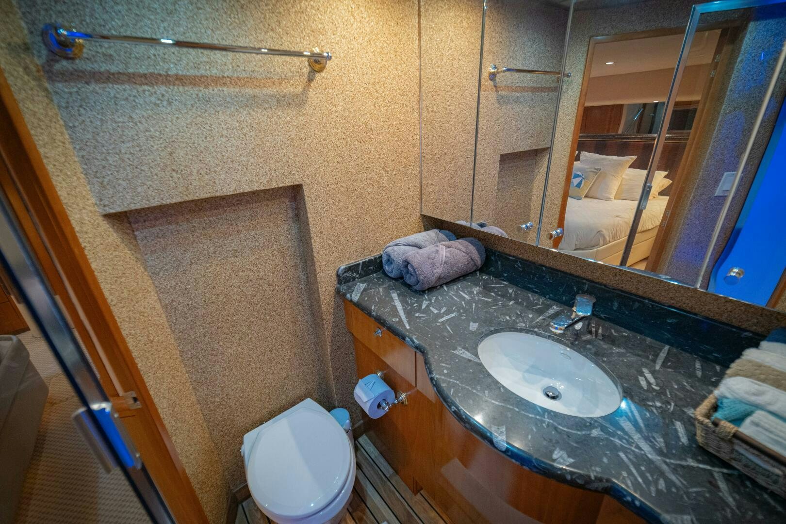 a bathroom with a sink and a mirror aboard MARLIN CLIPPER Yacht for Sale