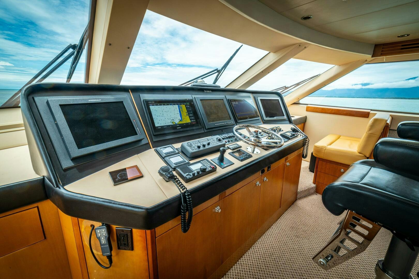 a room with a desk and computers aboard MARLIN CLIPPER Yacht for Sale