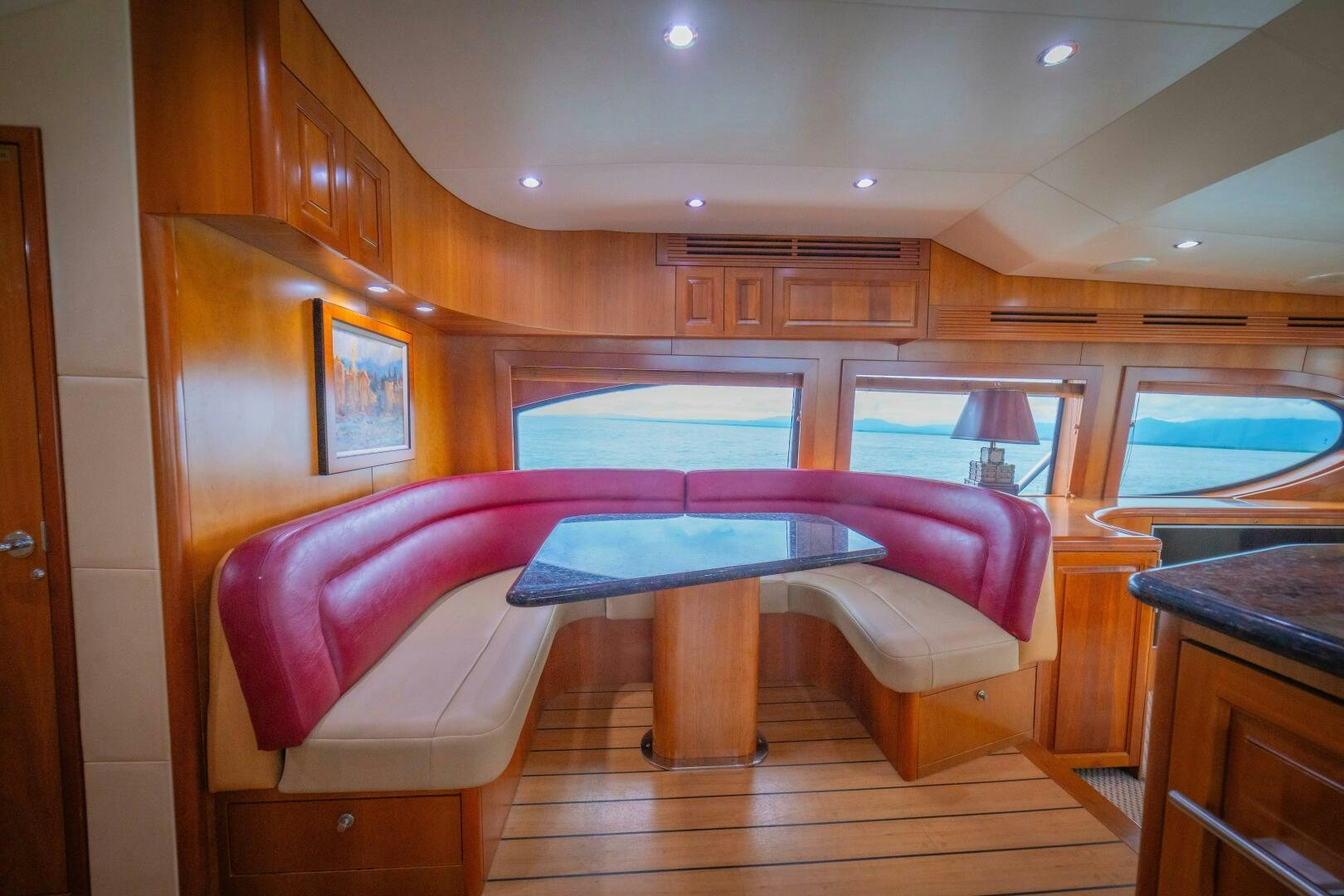 a room with a bed and a desk aboard MARLIN CLIPPER Yacht for Sale